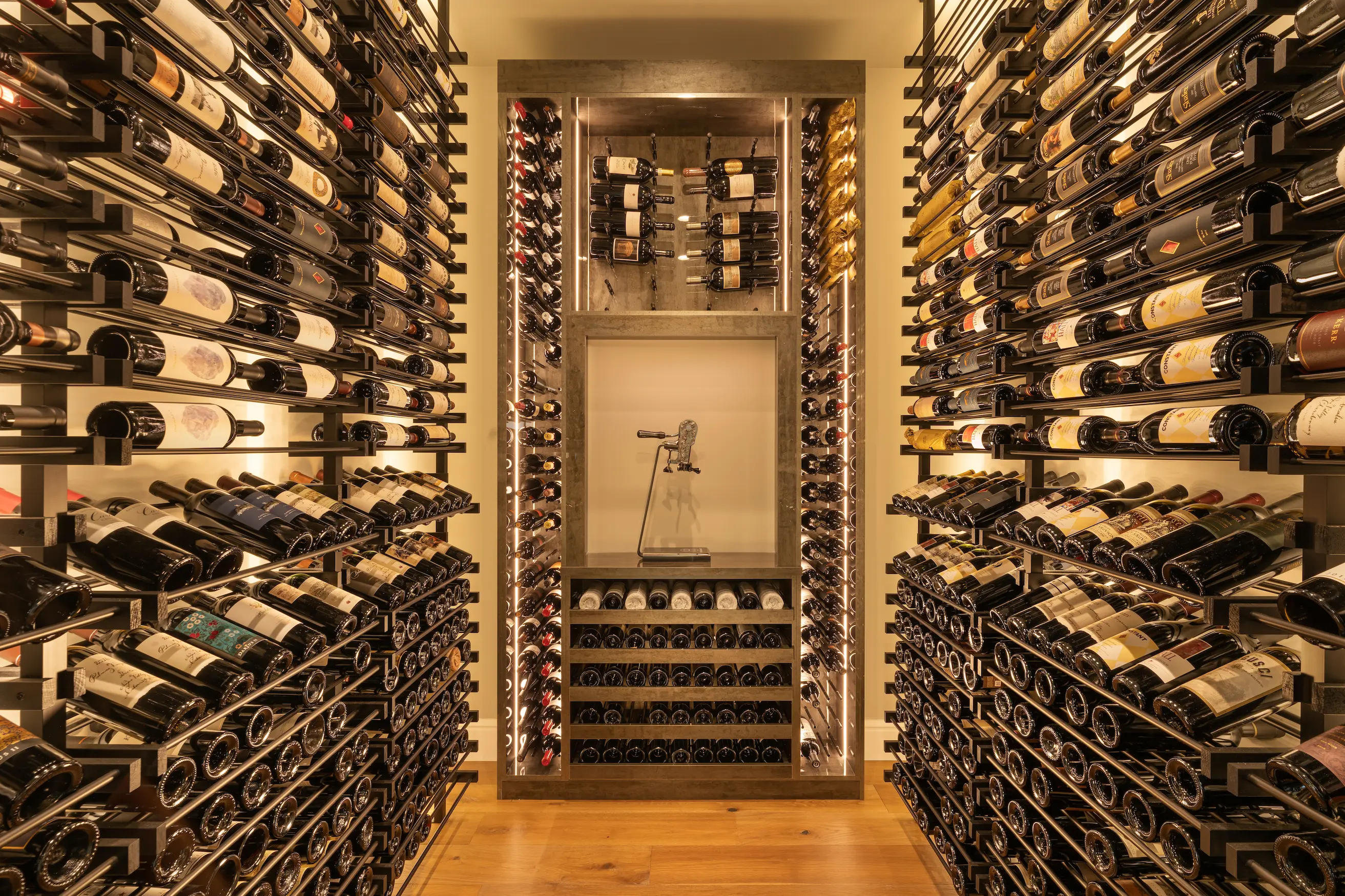 nfinity pool blending into the ocean view, minimalist sun loungers in soft neutral fabric, curved architecture