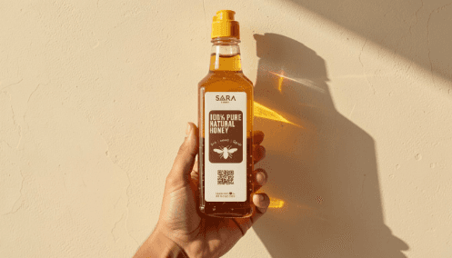 SAARA Honey bottle held in hand