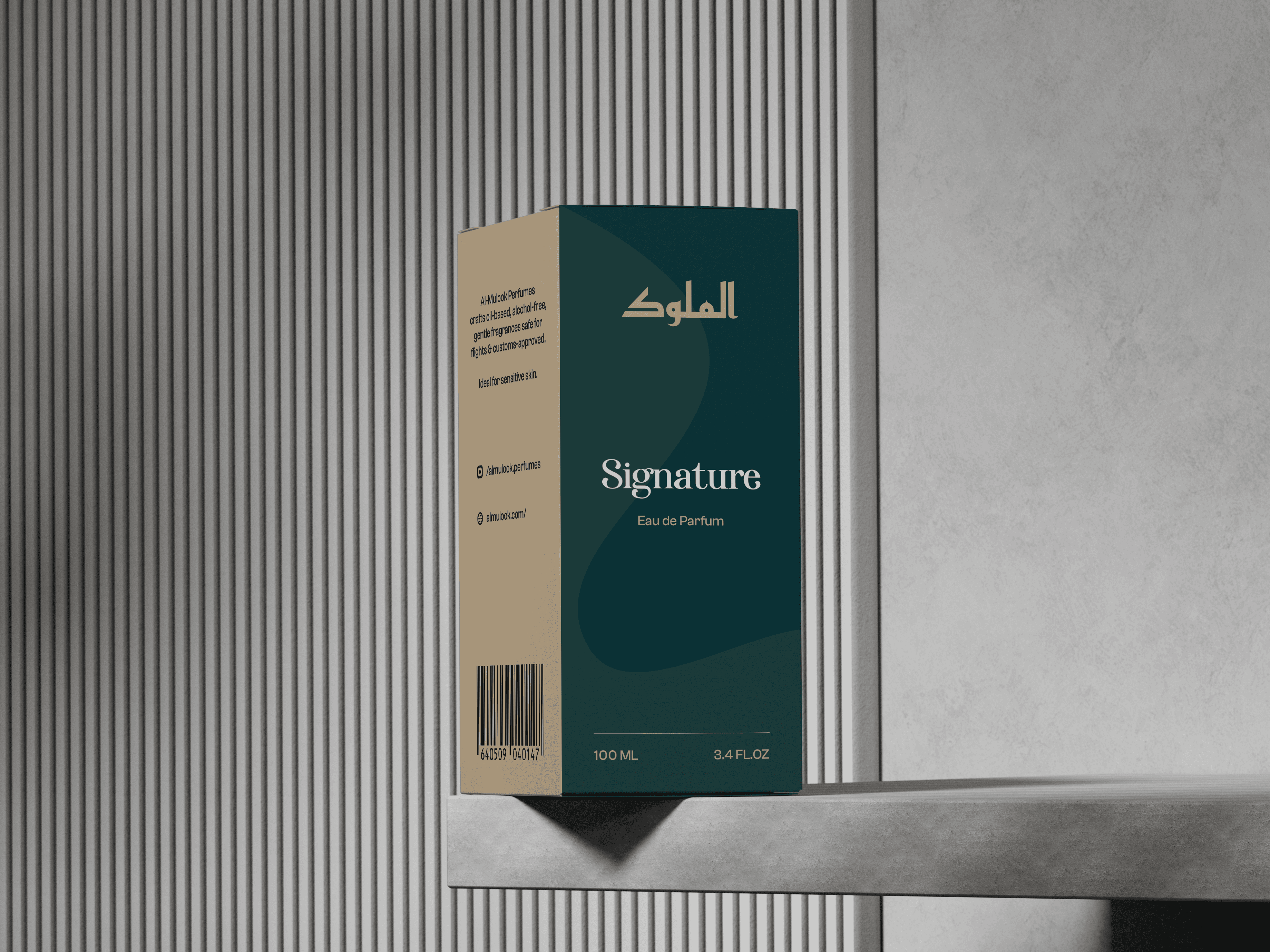 Al-Mulook amber-toned product packaging with gold logo photographed in warm, dramatic lighting.