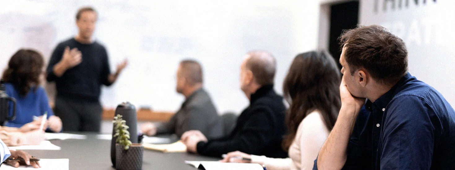 Table of people in meeting