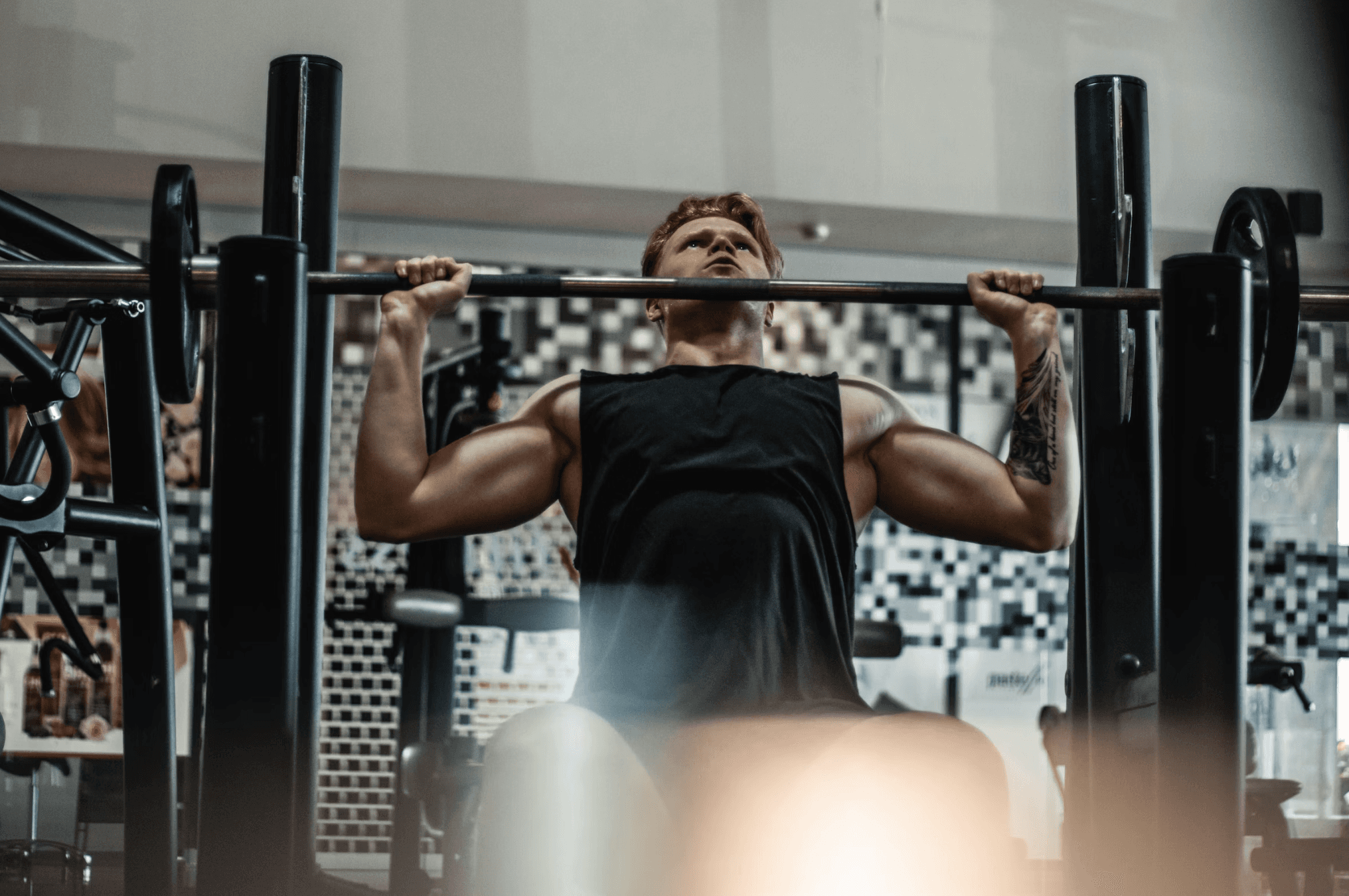 Bodybuilder Performing a Shoulder Press