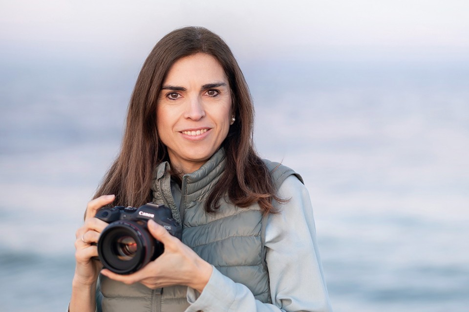 Photographer holding camera