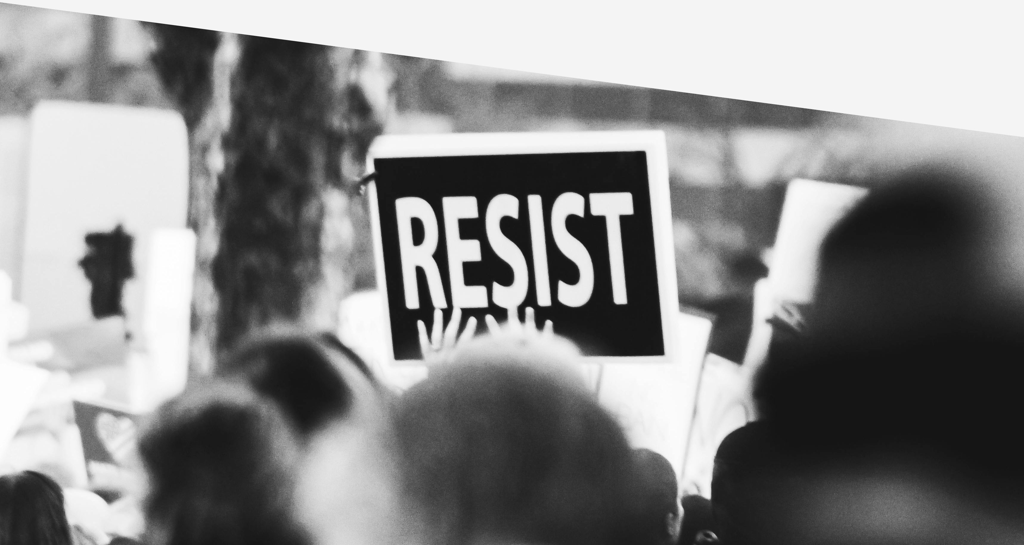 Blurry black and white photo of a protest