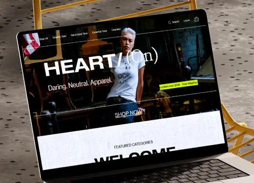 HEART/(On) Apparel custom eCommerce website design displayed on a laptop, showing the welcome screen and branding.