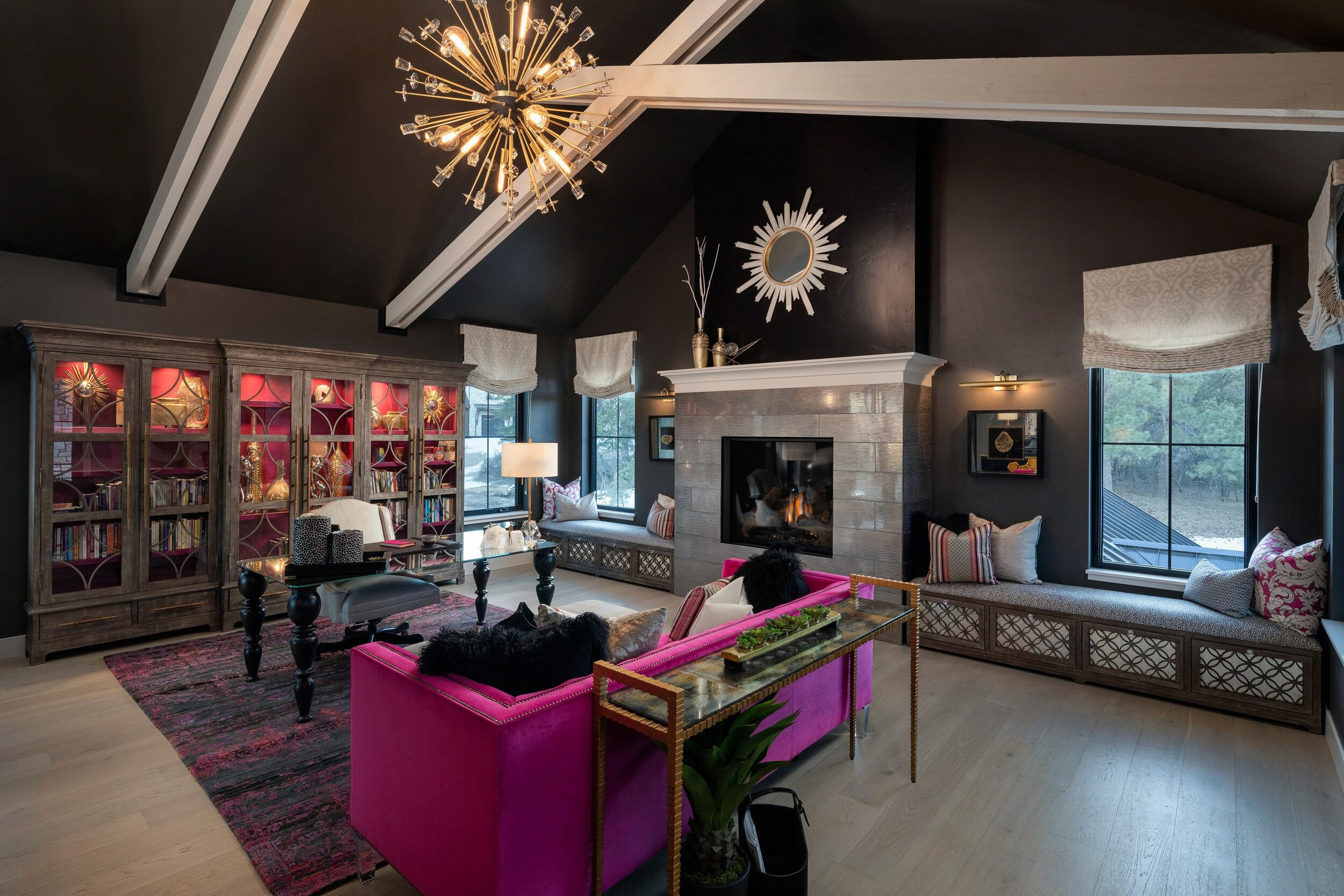 Luxurious living room with pink sofa and eclectic decor