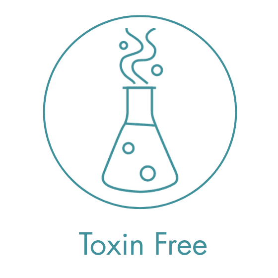 A wooden essential oil diffuser releasing a gentle stream of steam, surrounded by dried herbs and a small bottle of essential oil. The warm lighting enhances the cozy and therapeutic ambiance.