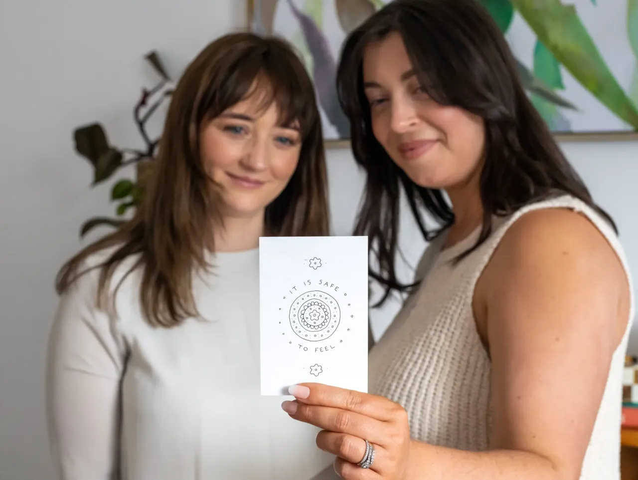 person holding baby's index finger