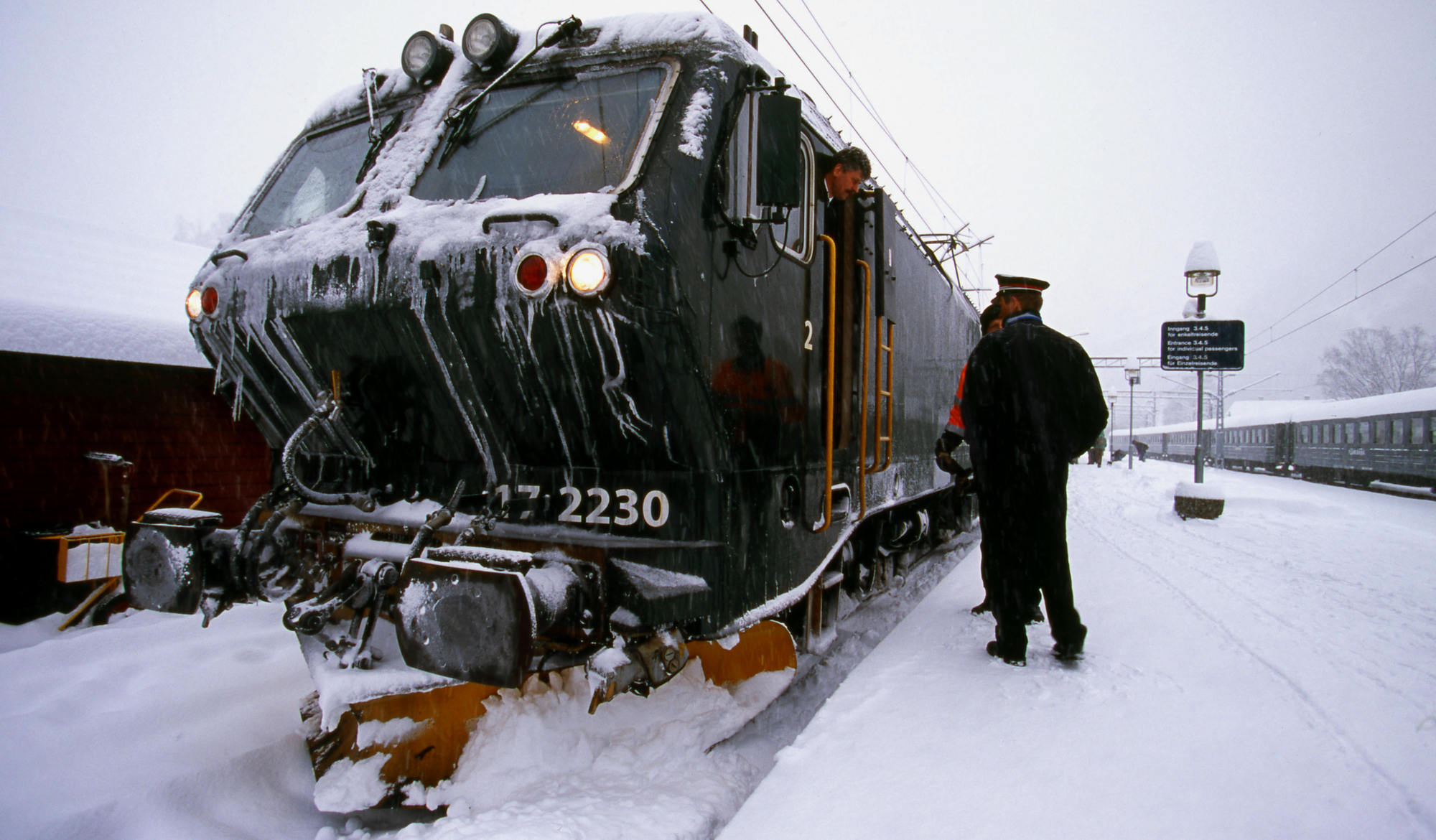 a train travels down the tracks
