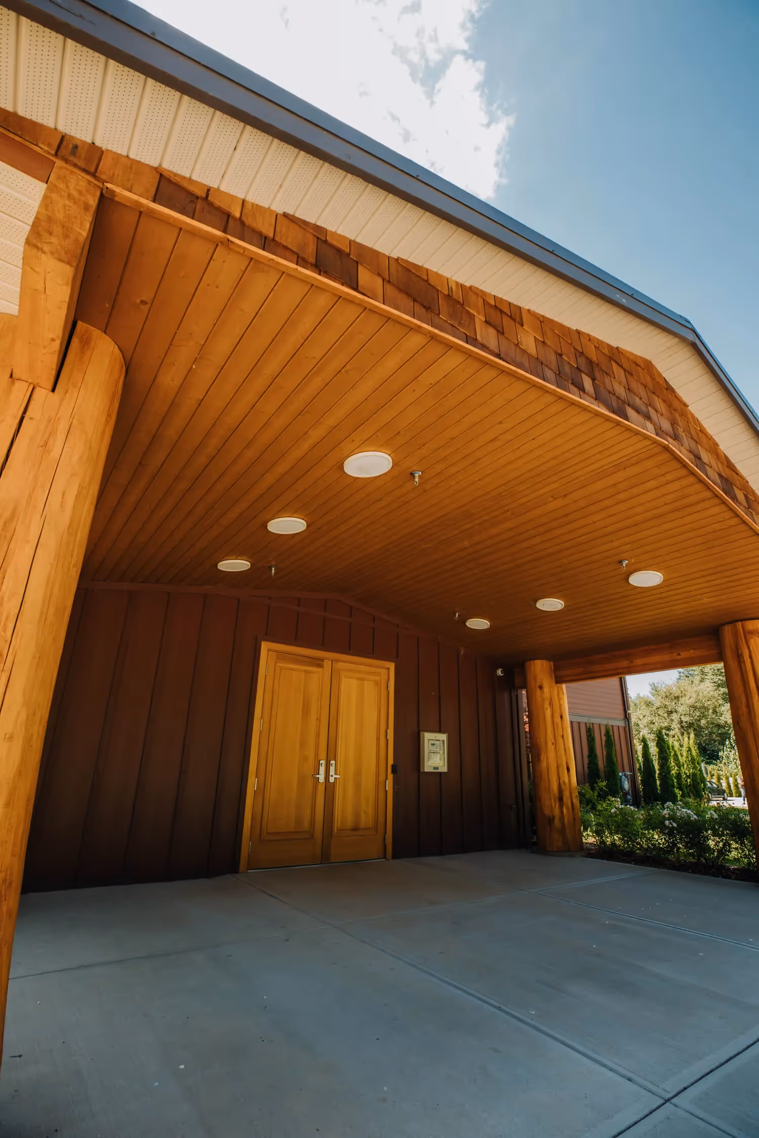 Ch’íyáqtel First Nation architectural photography showing the project building and surrounding landscape visual presentation focused