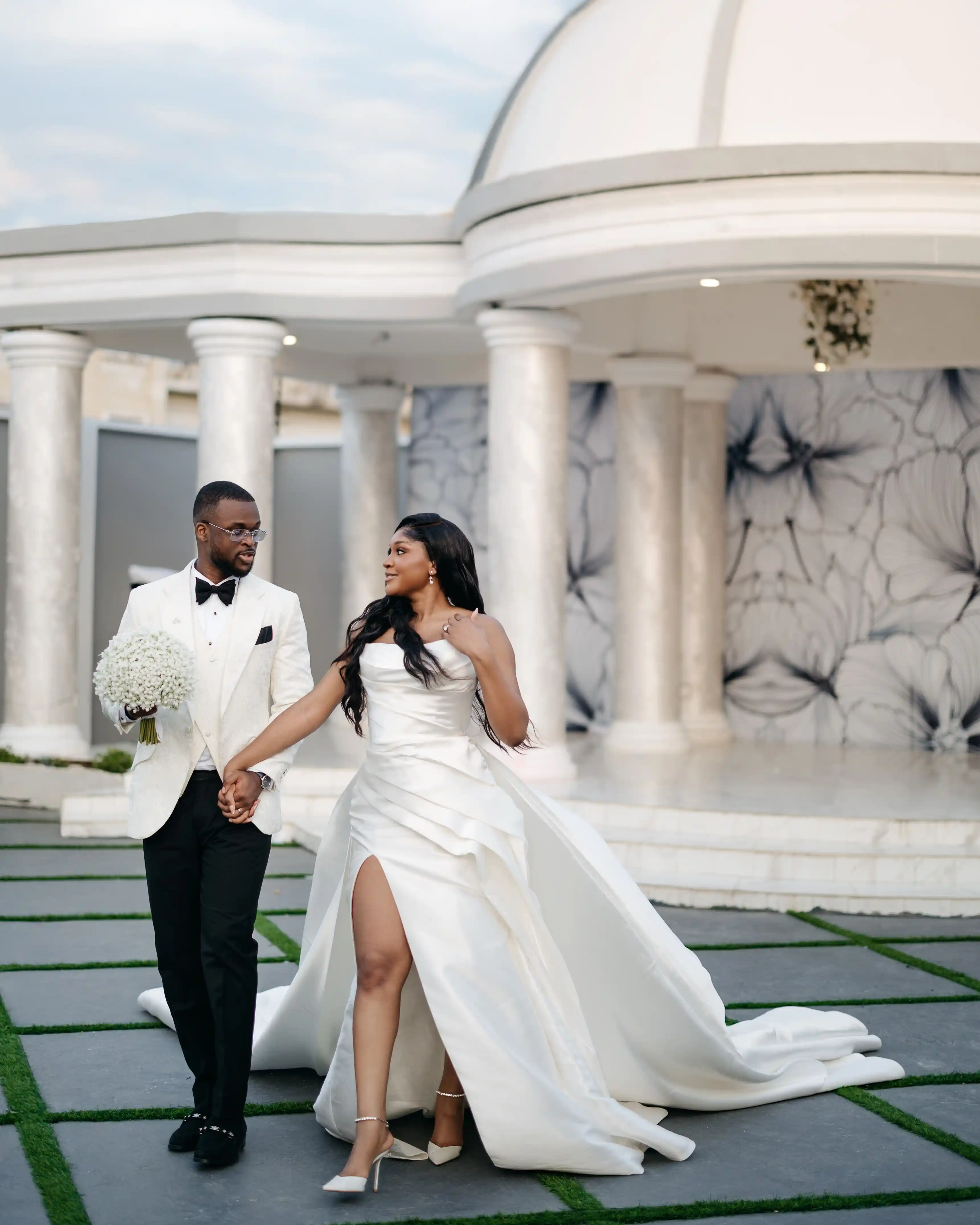 Bride and groom celebrating a luxury wedding coordinated by Victoria Brooks Events, a premium wedding planner in Nigeria.
