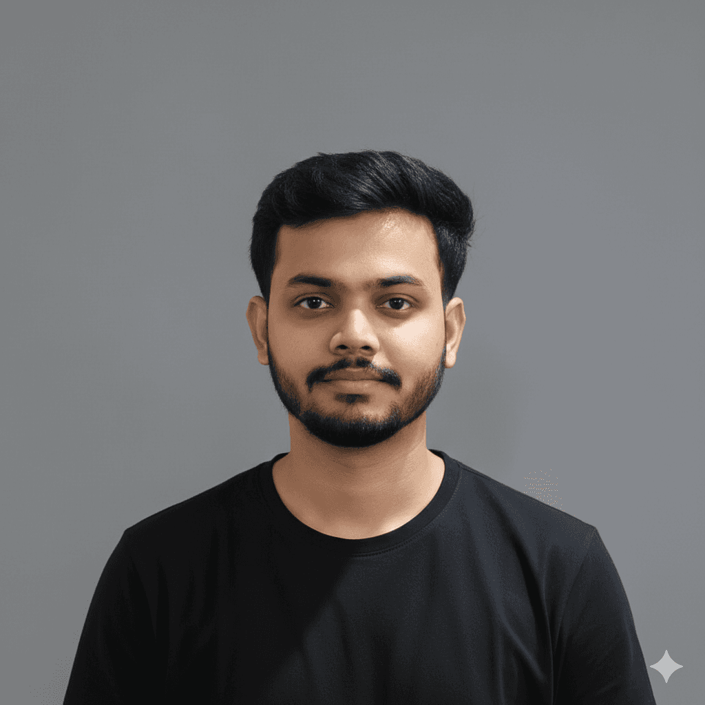 A woman with short hair wearing a black shirt, looking confidently at the camera.