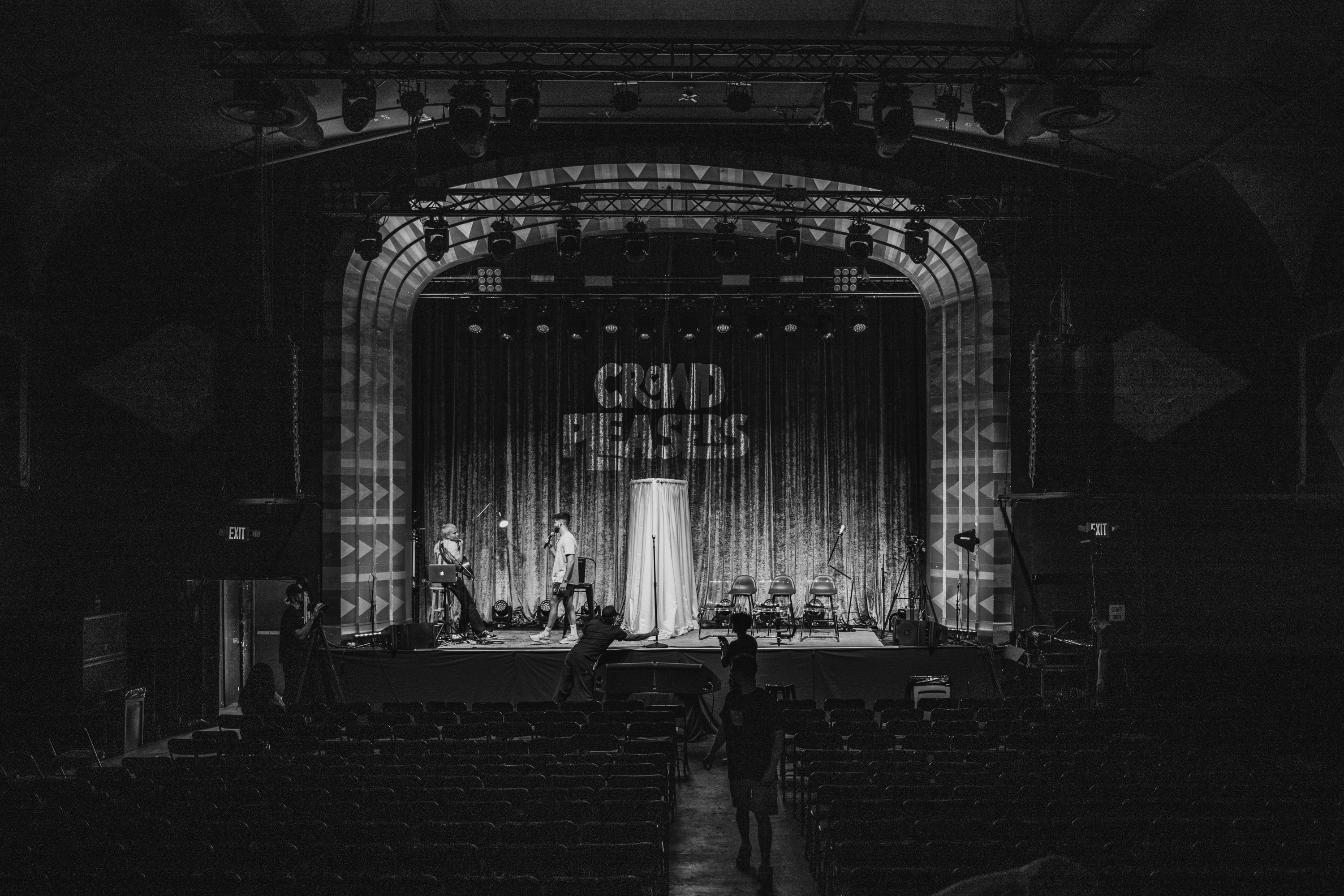 Group of people relaxing outdoors on a field or lawn