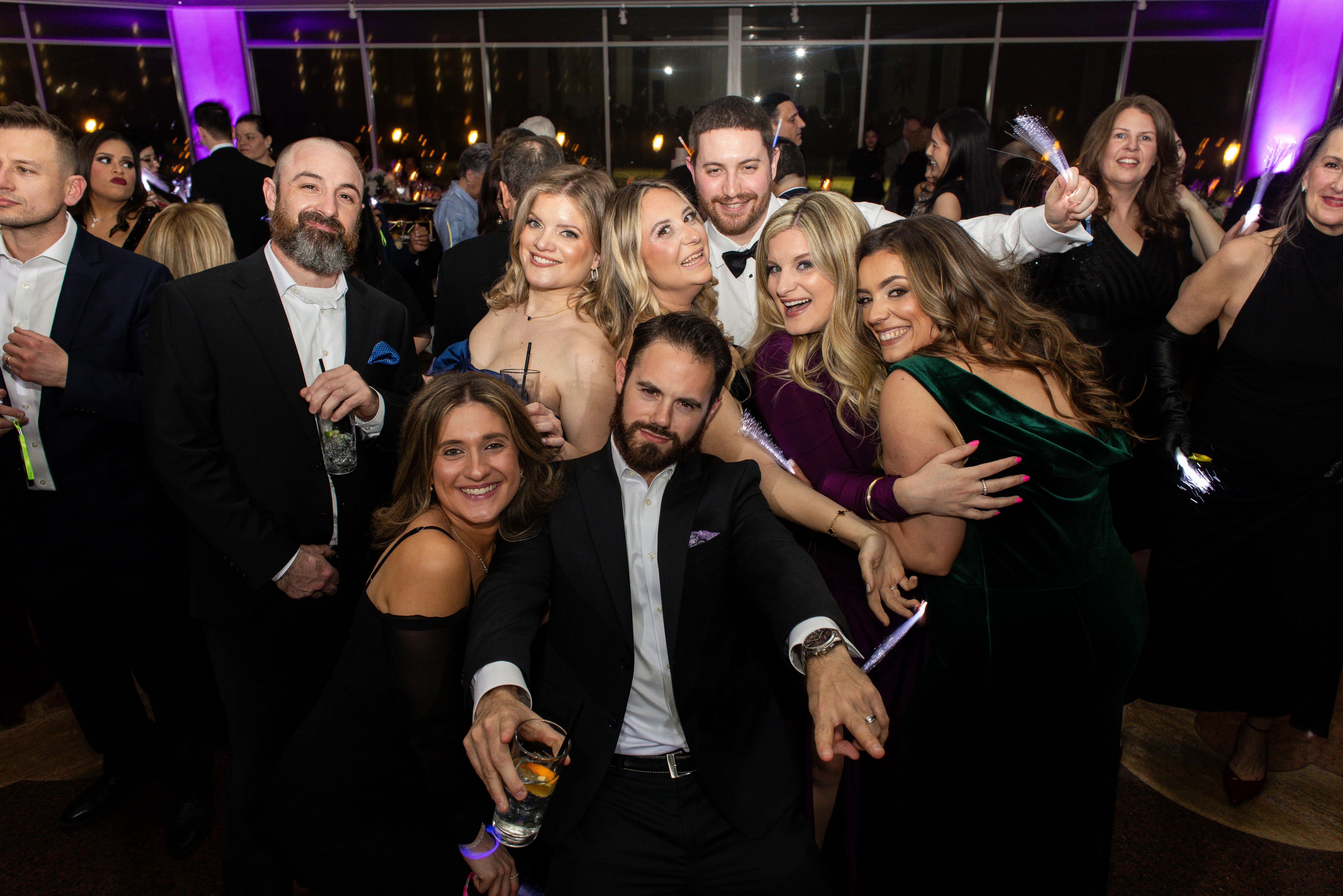 NYC wedding DJ with packed dance floor and guests celebrating