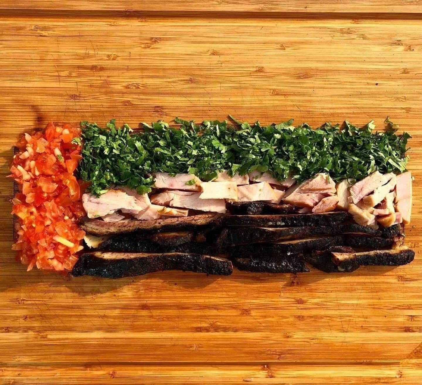 BBQ restaurant dubai showcasing cooked barbecue meat with bold spices, herbs, and seasonings prepared for slow smoking