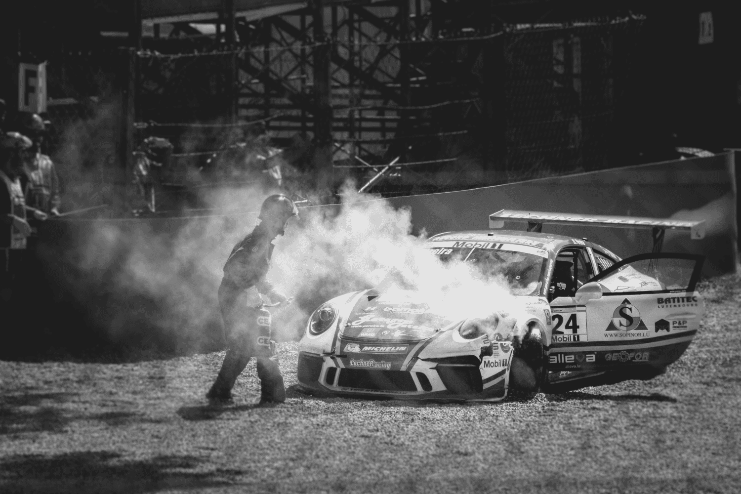 crashed Porsche race car