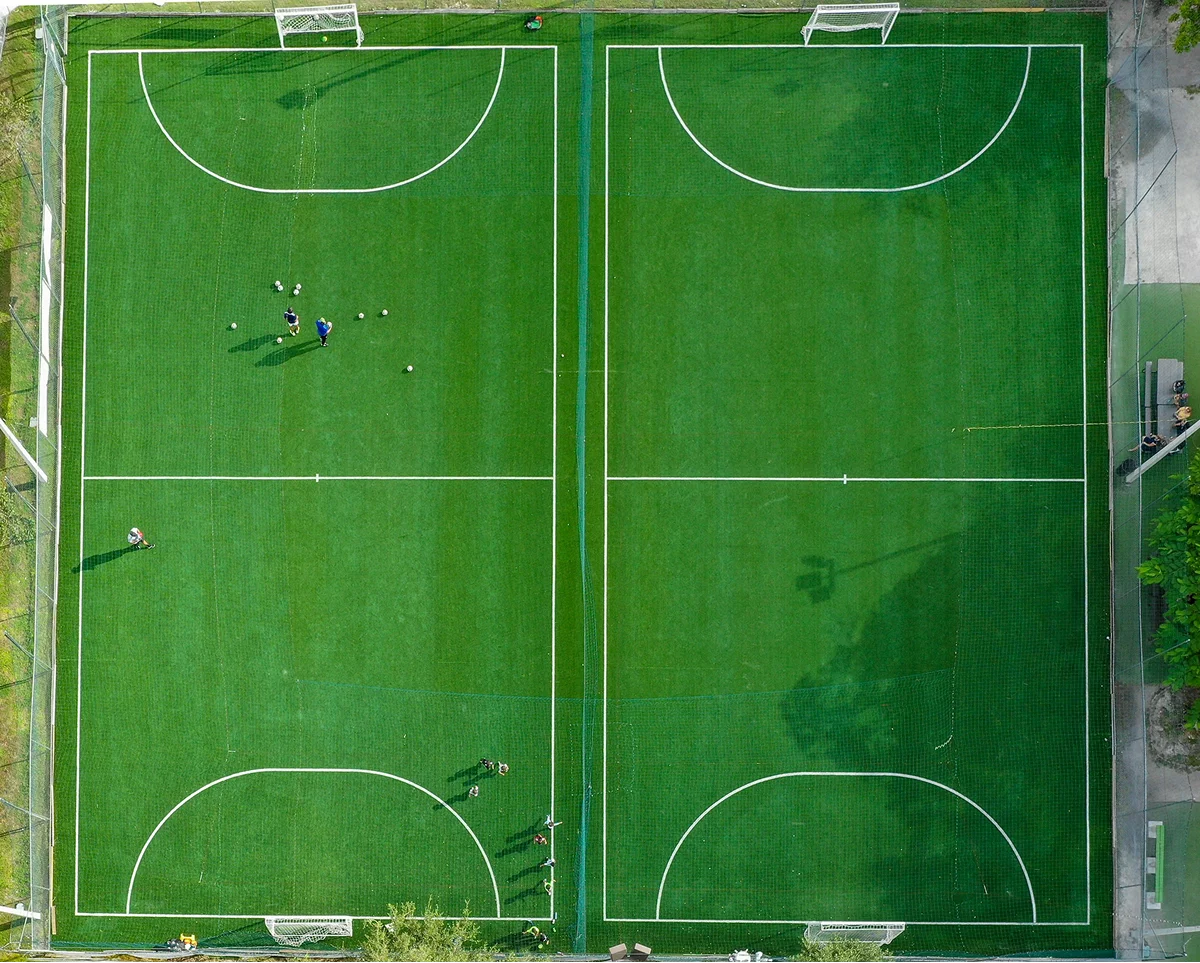 Aerial view of two outdoor artificial-turf soccer fields