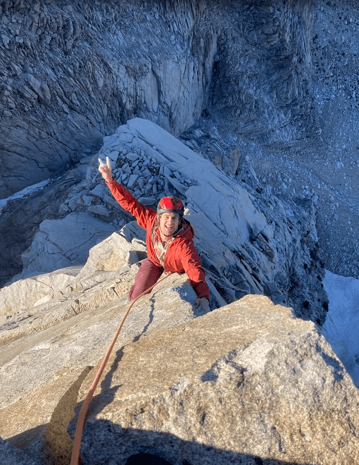 Climber on alpine peak