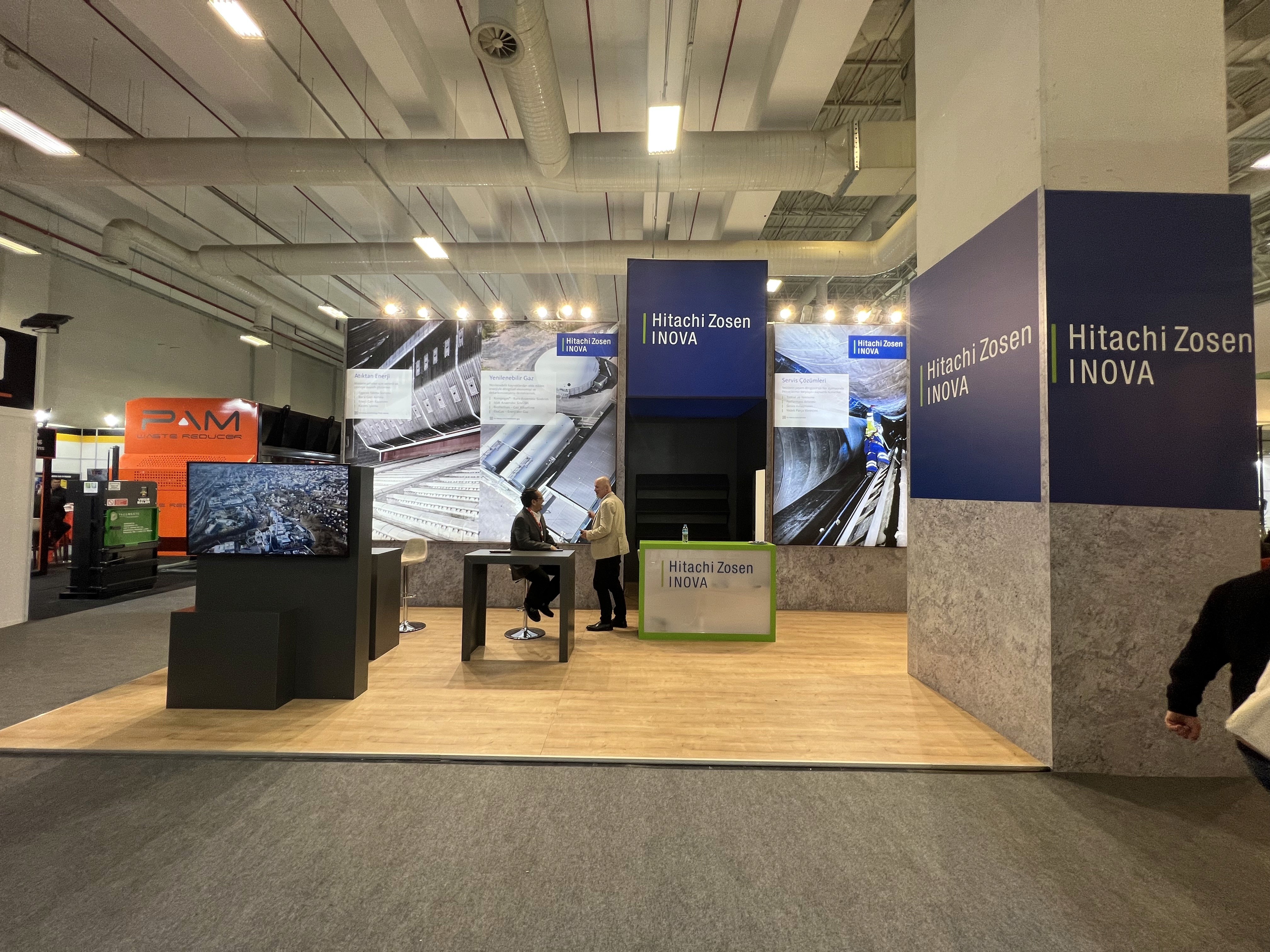 Meeting or networking area within the Swiss Pavilion, designed for business discussions and client.