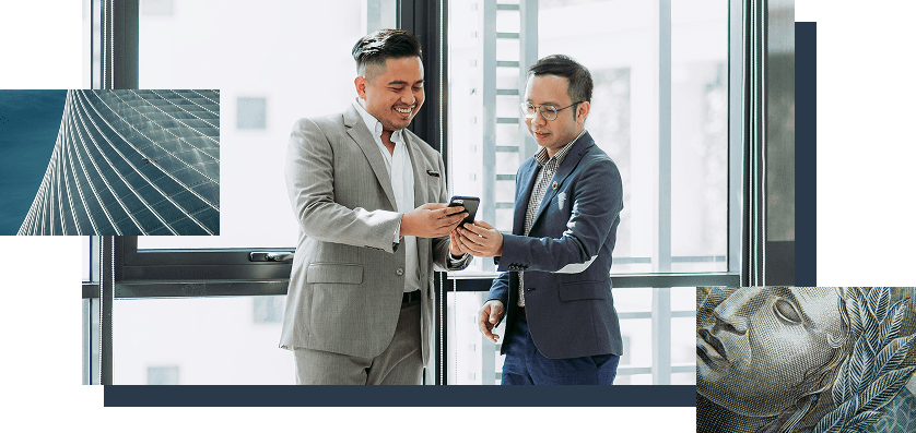 Two business professionals in suits engaging in a conversatio