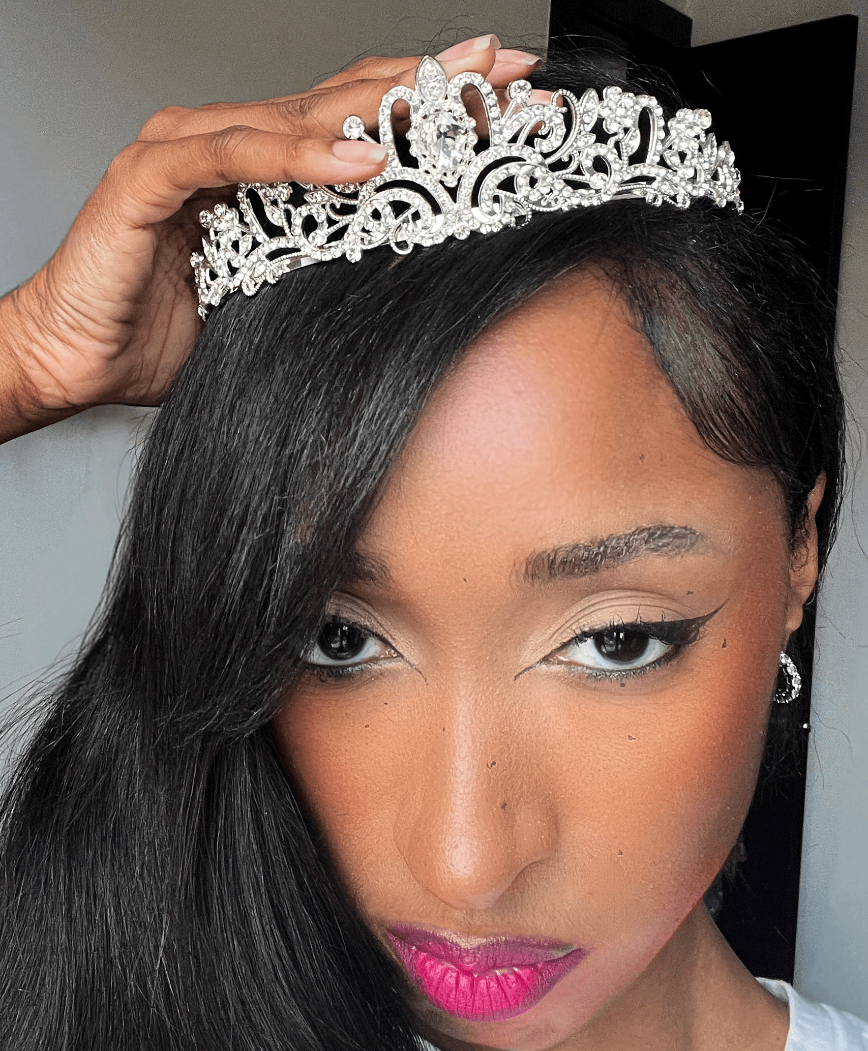 a blurry photo of a person standing in front of a wall