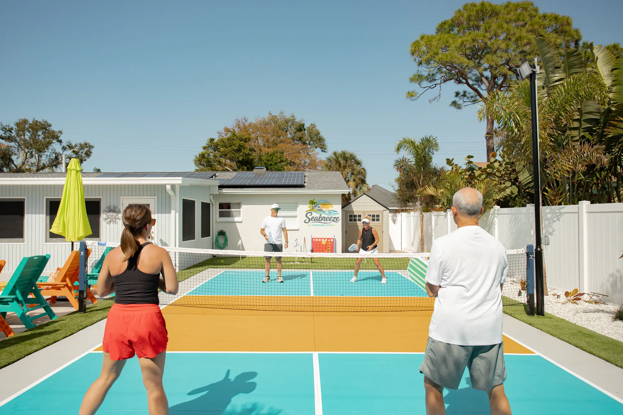 A doubles game on the private pickleball court at Pickleball Resort, Bradenton, Florida