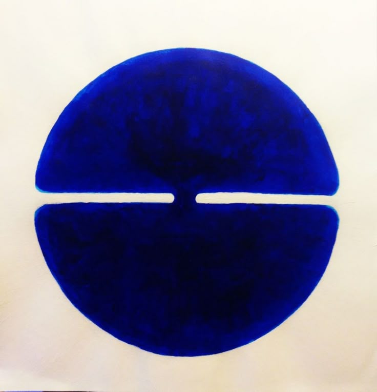 Professional headshot of a person in a formal setting.