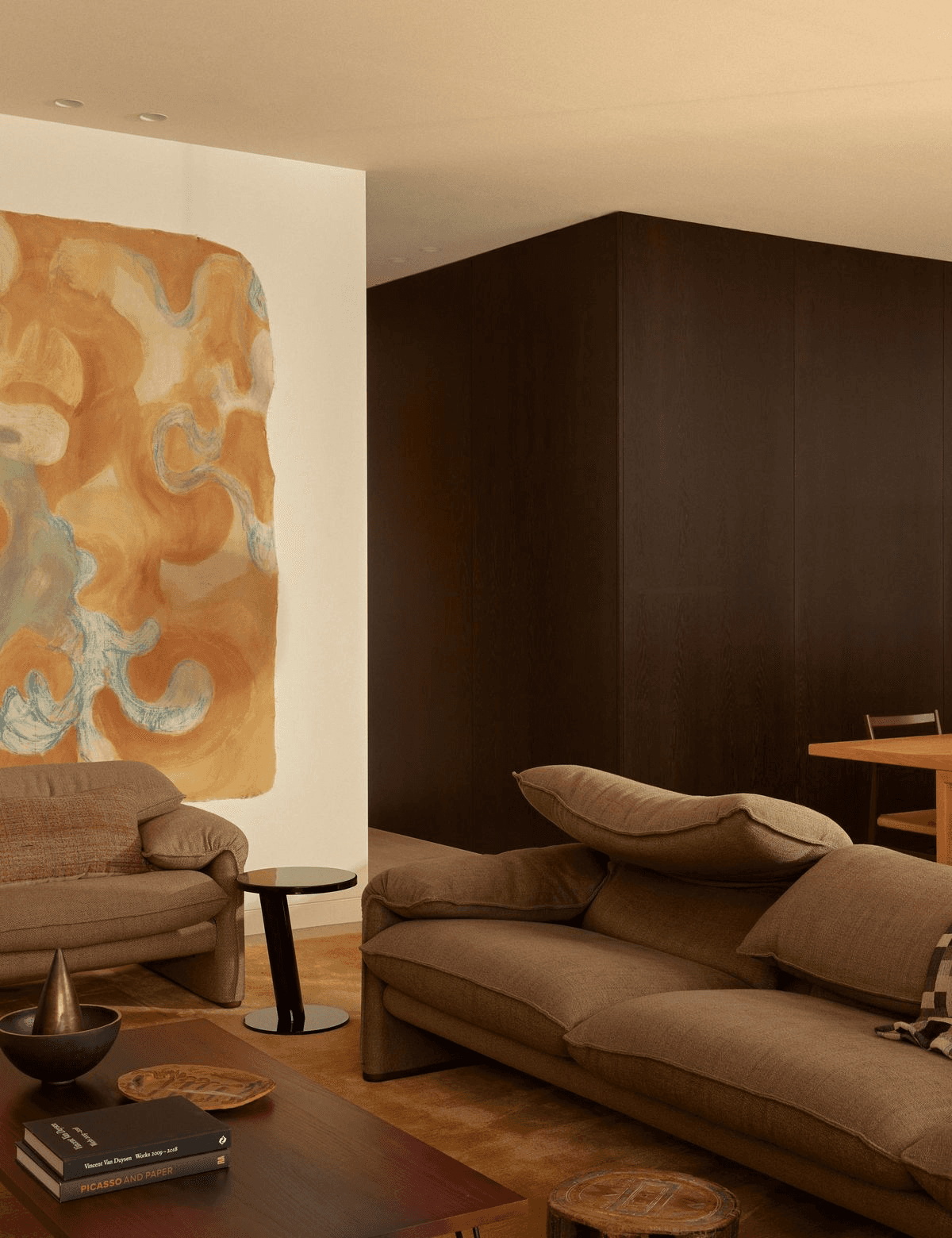 grayscale photo of person using MacBook