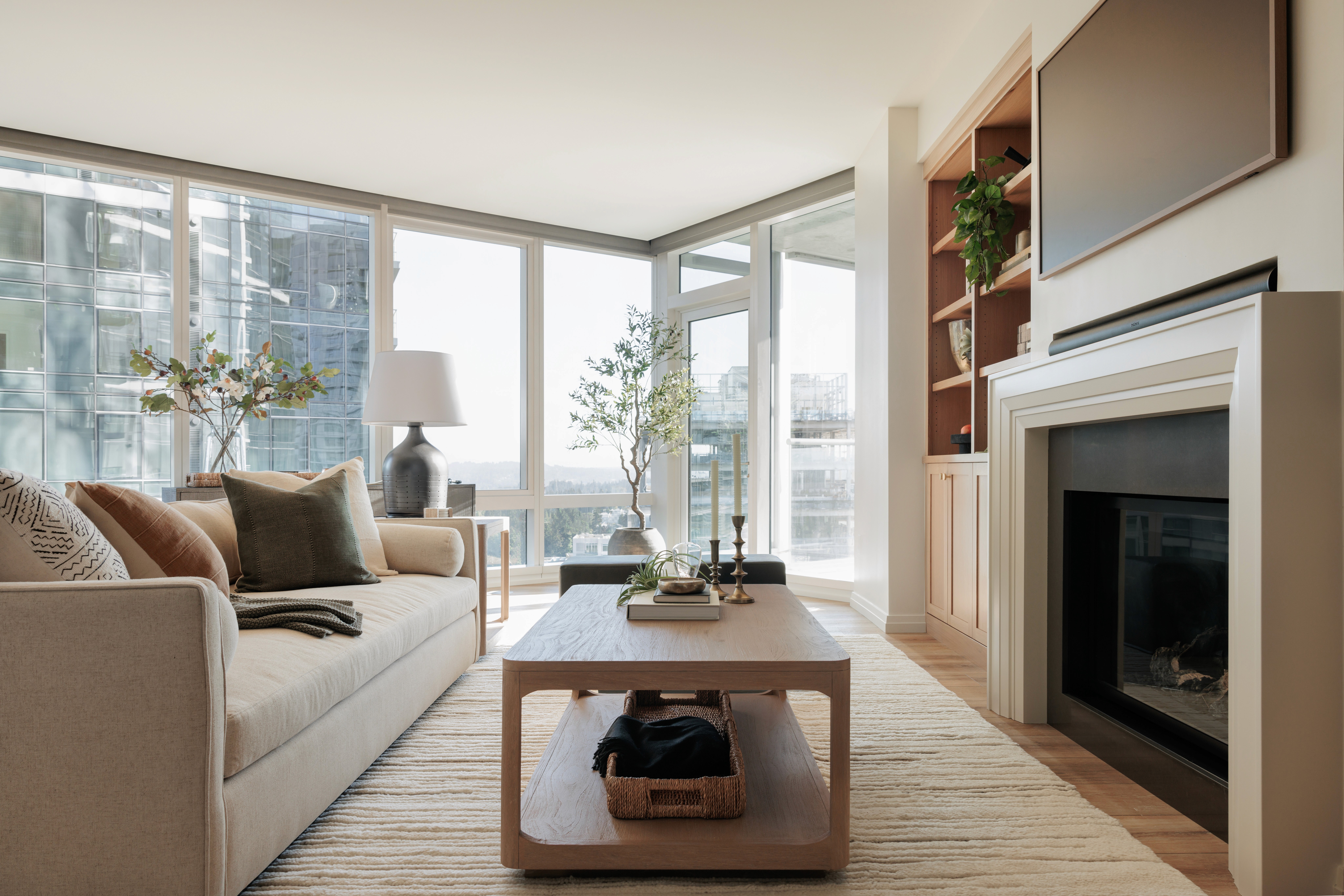 A remodeled living room from a Bellevue Tower Home by Elegant Simplicity in Bellevue WA.  Elegant Simplicity is a full service interior design firm that offers interior design as well as home organization services.