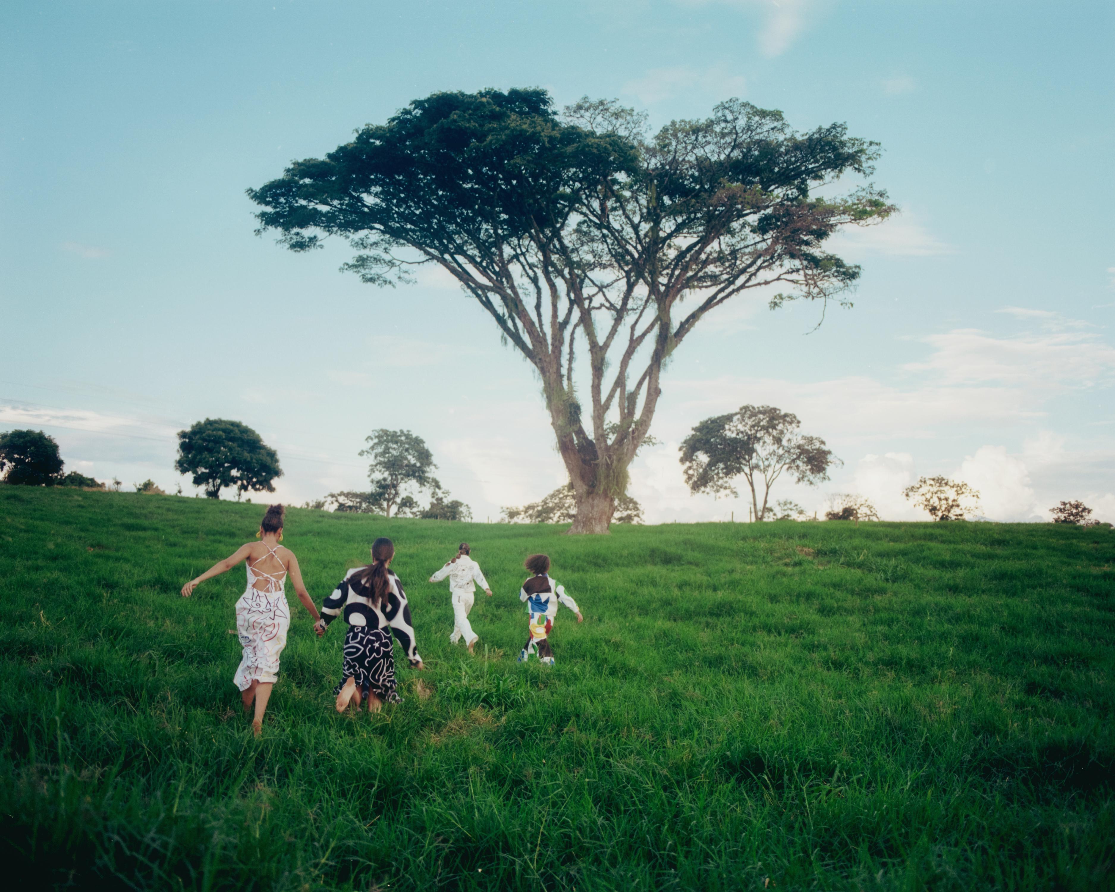 Women running in a field