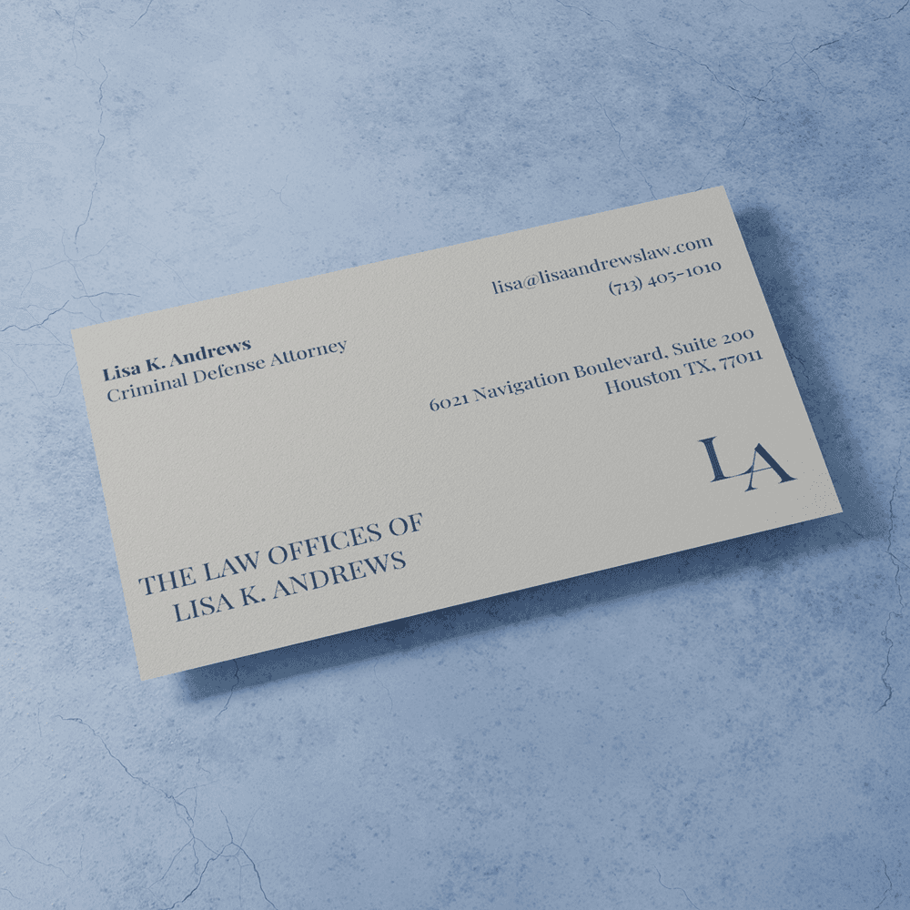 Business card mockup showcasing the refined typography and minimal legal branding.