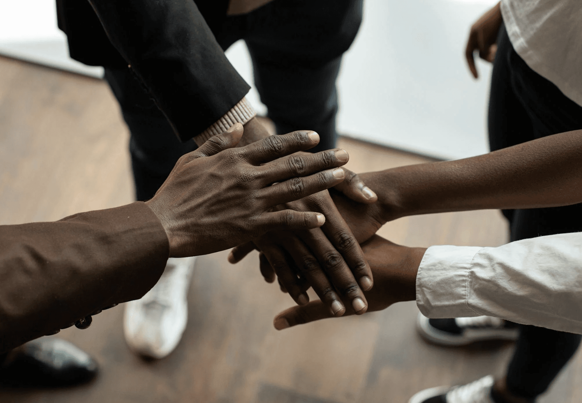 Group of men standing with Sufboard