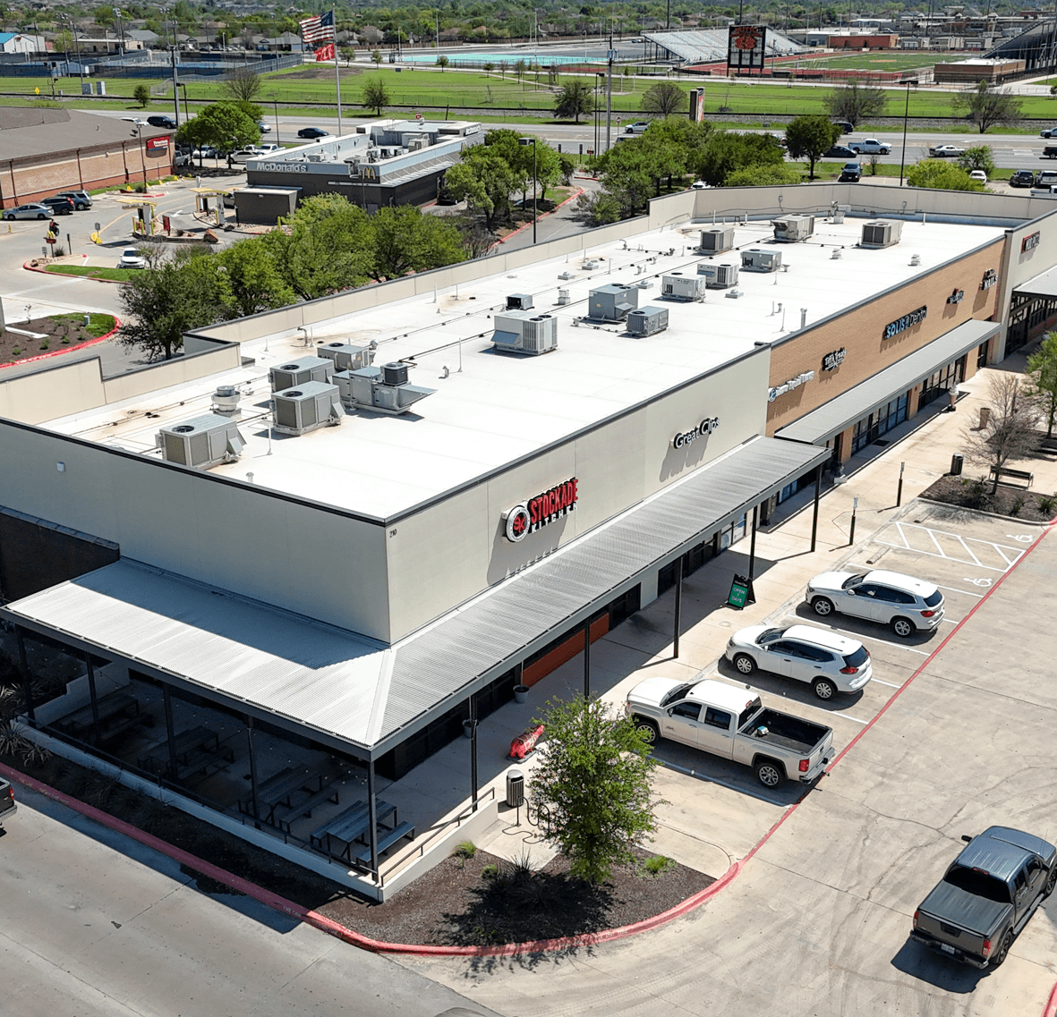 Commercial building with a metal wrapped patio roof