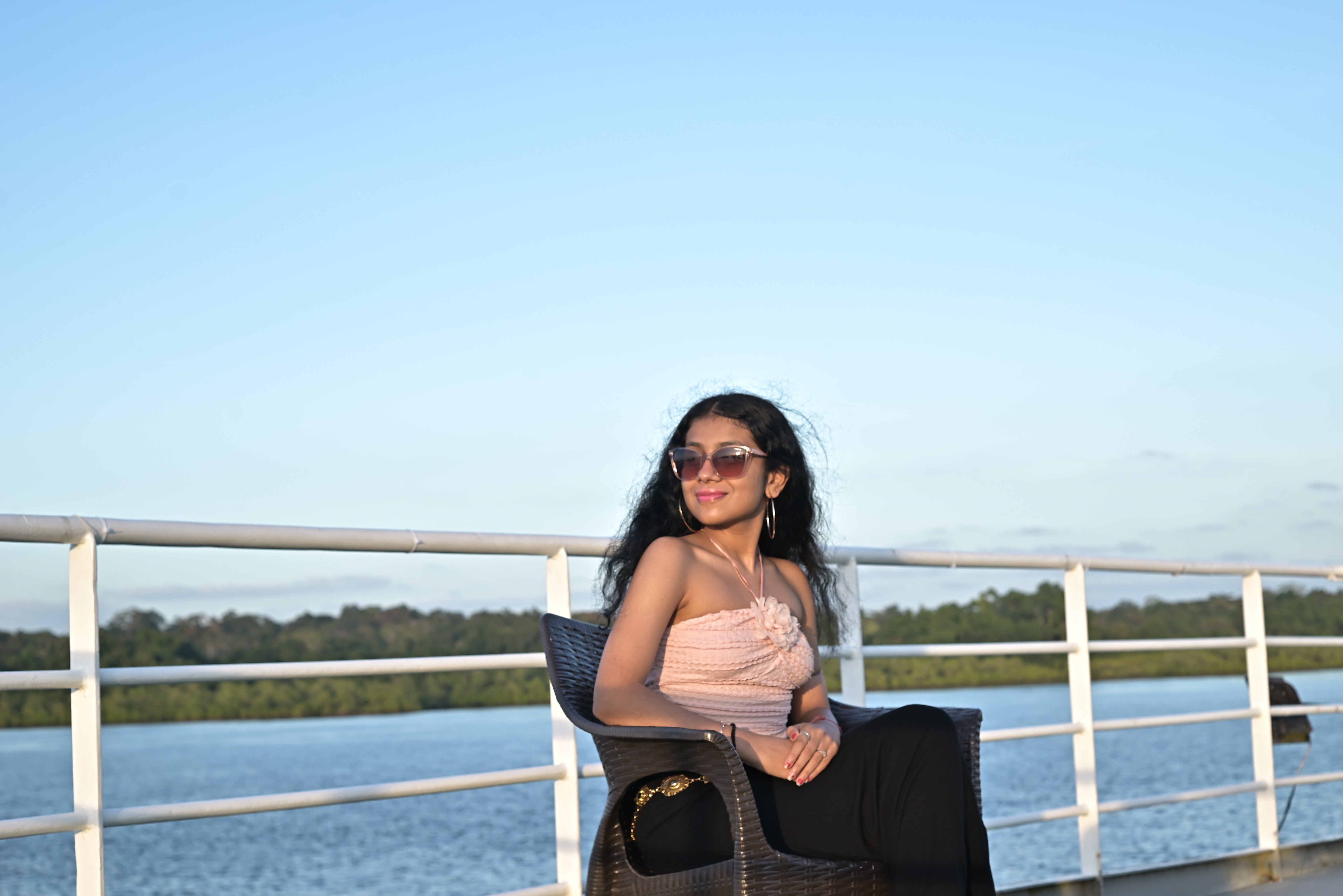 Sheersha sitting on a chair
