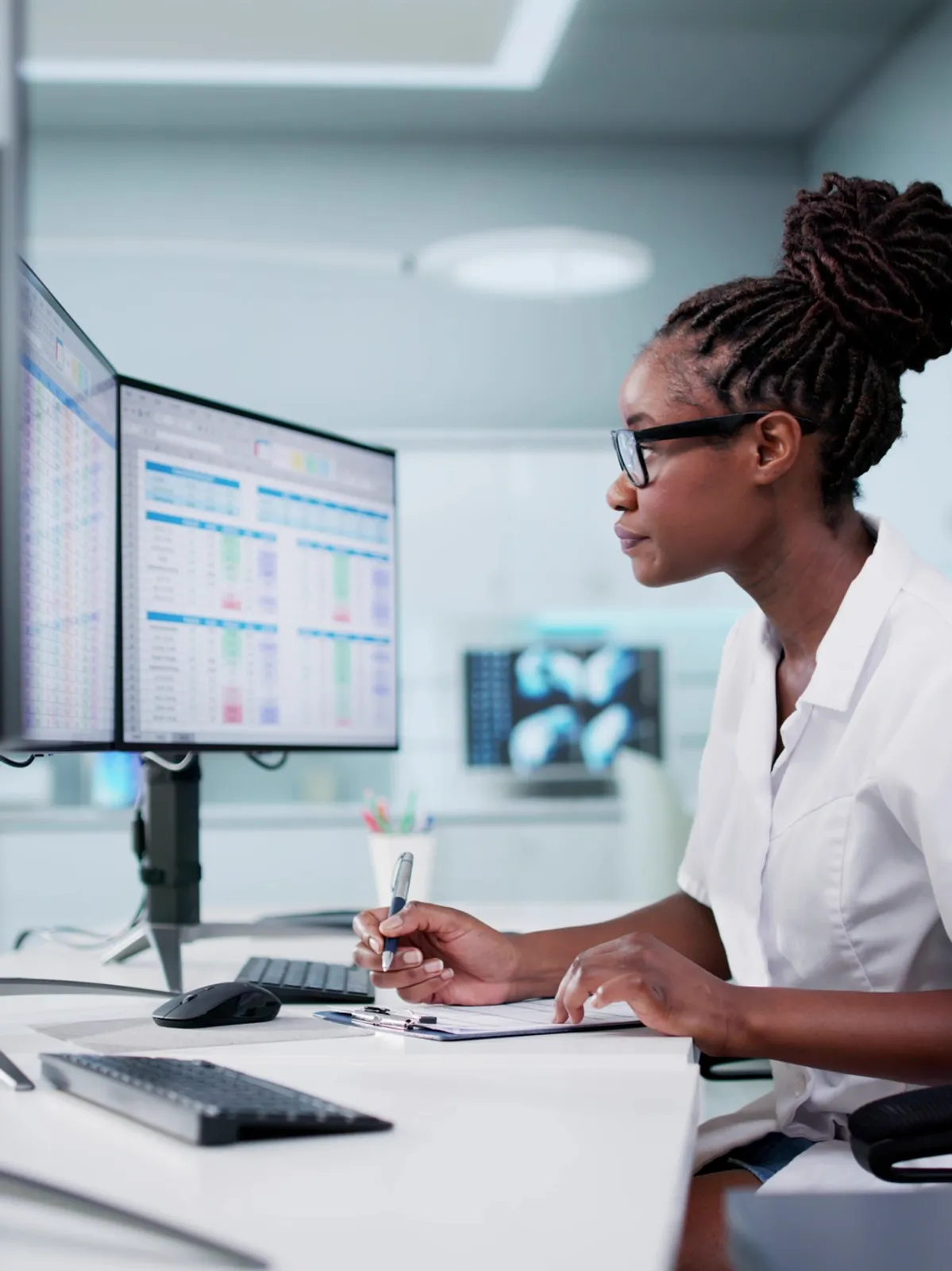 Professional analyst using AI-powered tools and automation software for enterprise digital transformation enablement.