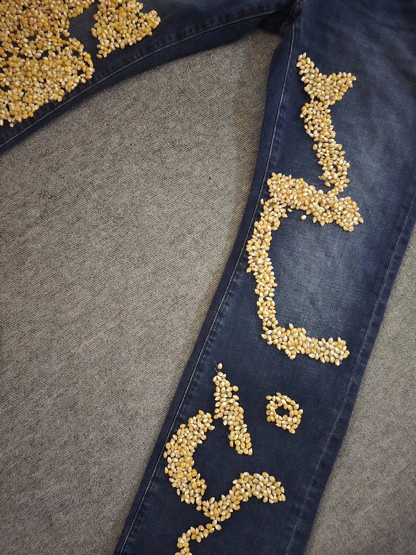 Two denim sections photographed from above with irregular kernel paths revealing the sequence of the hand-applied construction.