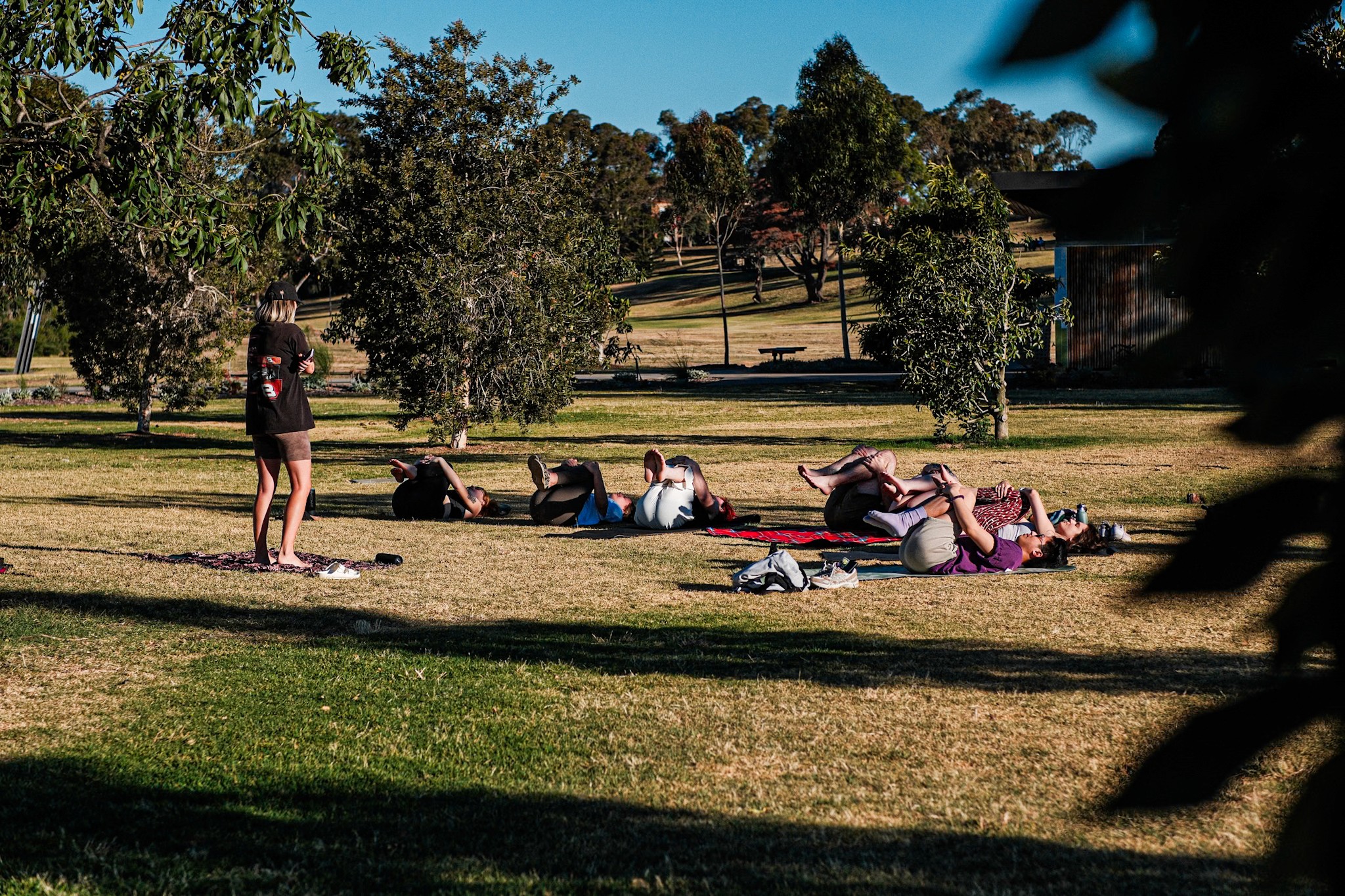 Commercial photography by JamesTheLyon for PixelSpaces — events, gigs, headshots, people, and architecture — park yoga namaste mindfulness grounded local community 