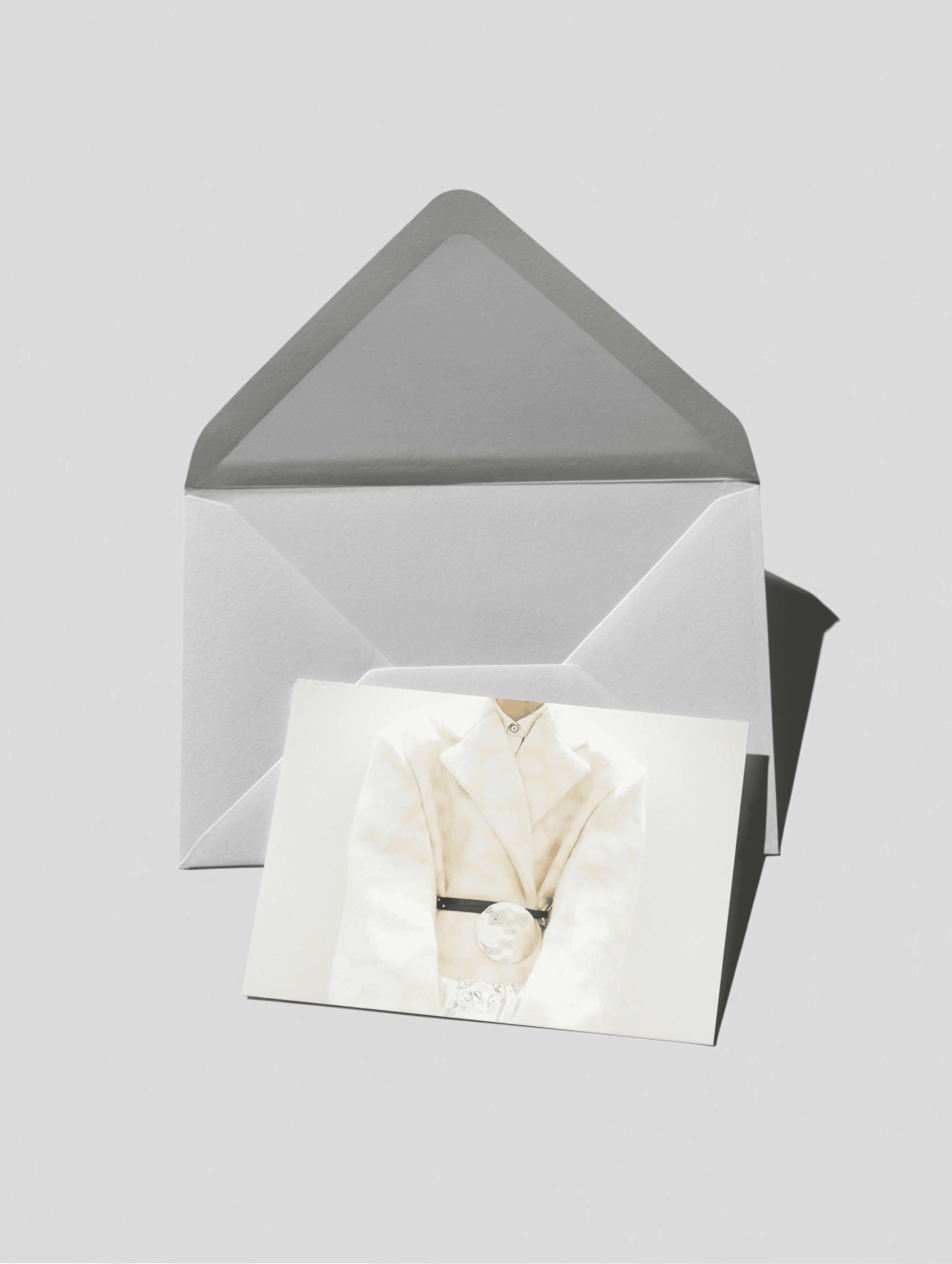 A modern stationery mockup featuring an envelope and matching card — perfect for presenting brand identity, logo, or packaging designs. Shot with soft shadows and natural tones, it reflects a professional editorial quality. The composition is balanced and minimal, allowing the printed elements to stand out with clarity and depth.