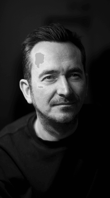 Music producer sitting in his studio