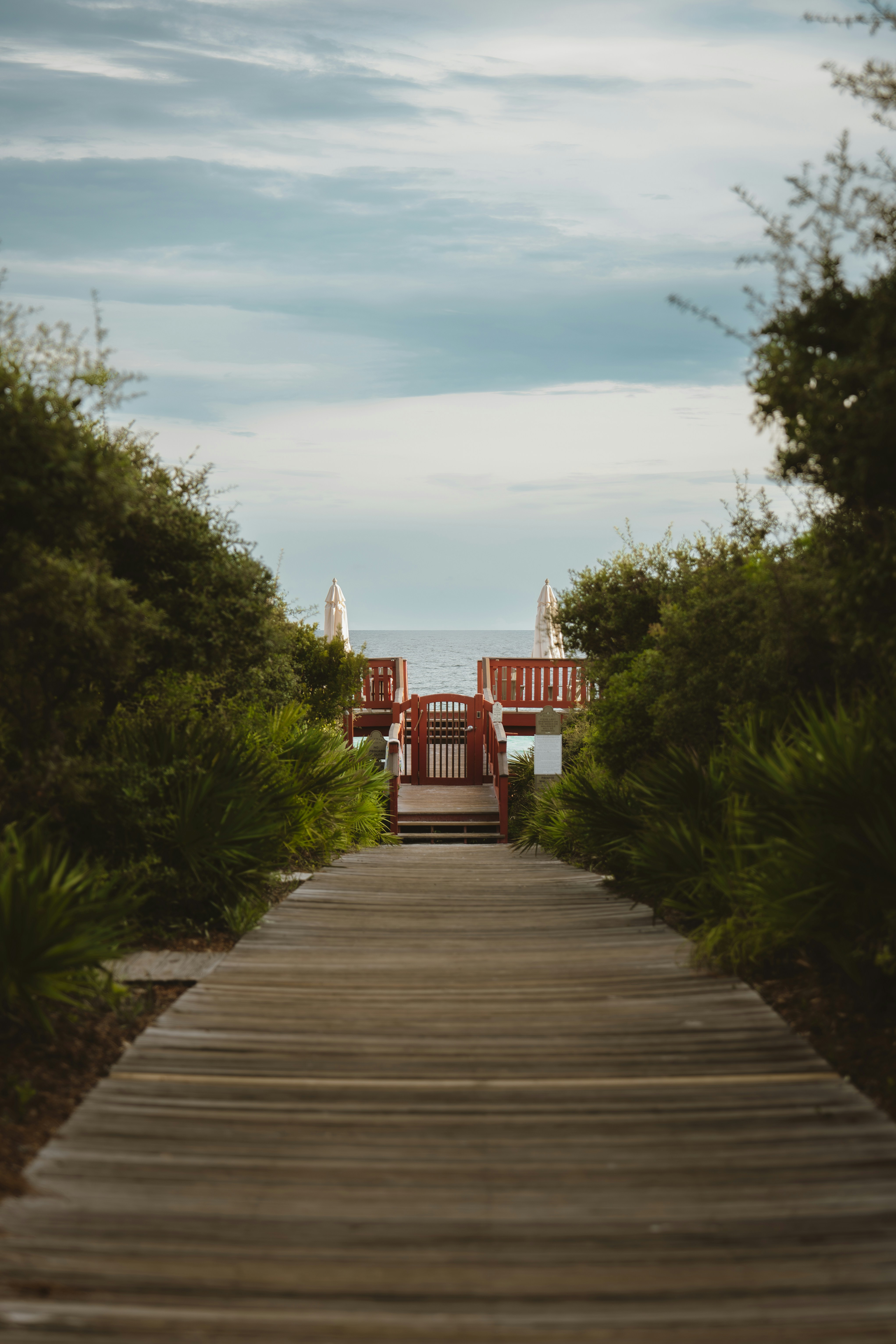 A wooden walkway leading to the beach