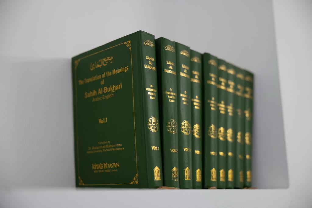 a black and white living room with a large tv