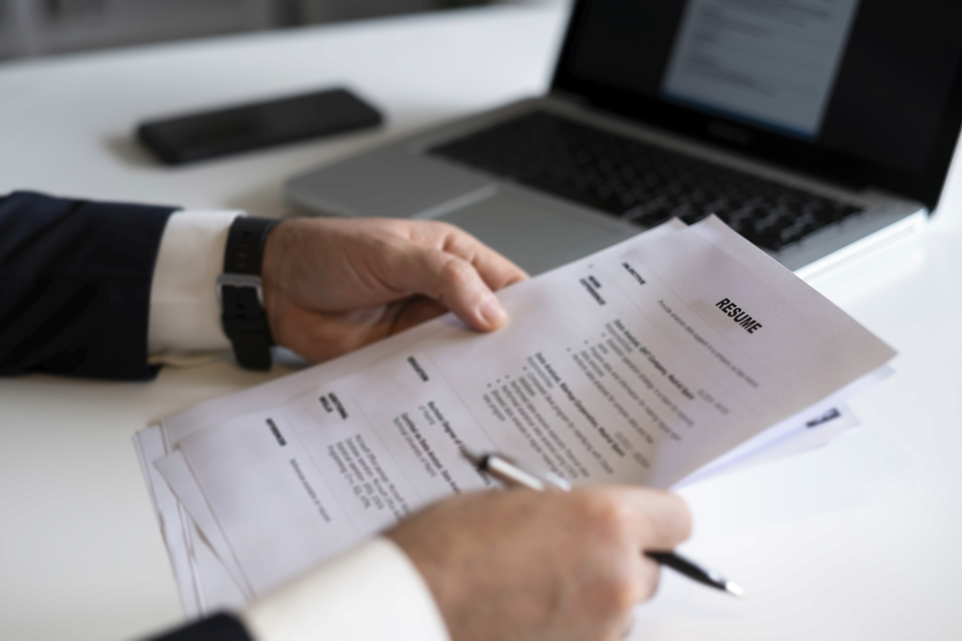 Hiring manager reviewing application