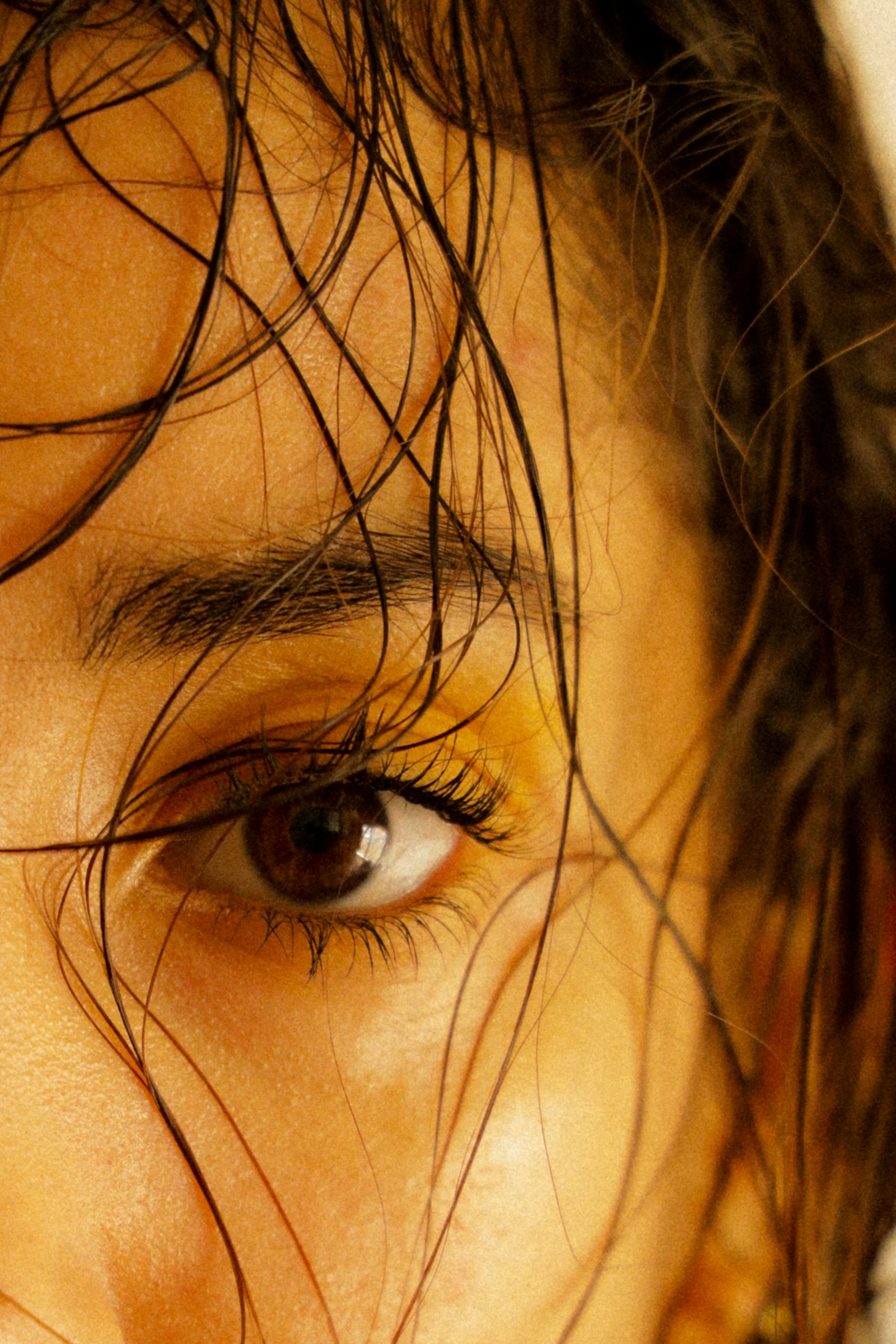 a woman pointing her finger at the camera