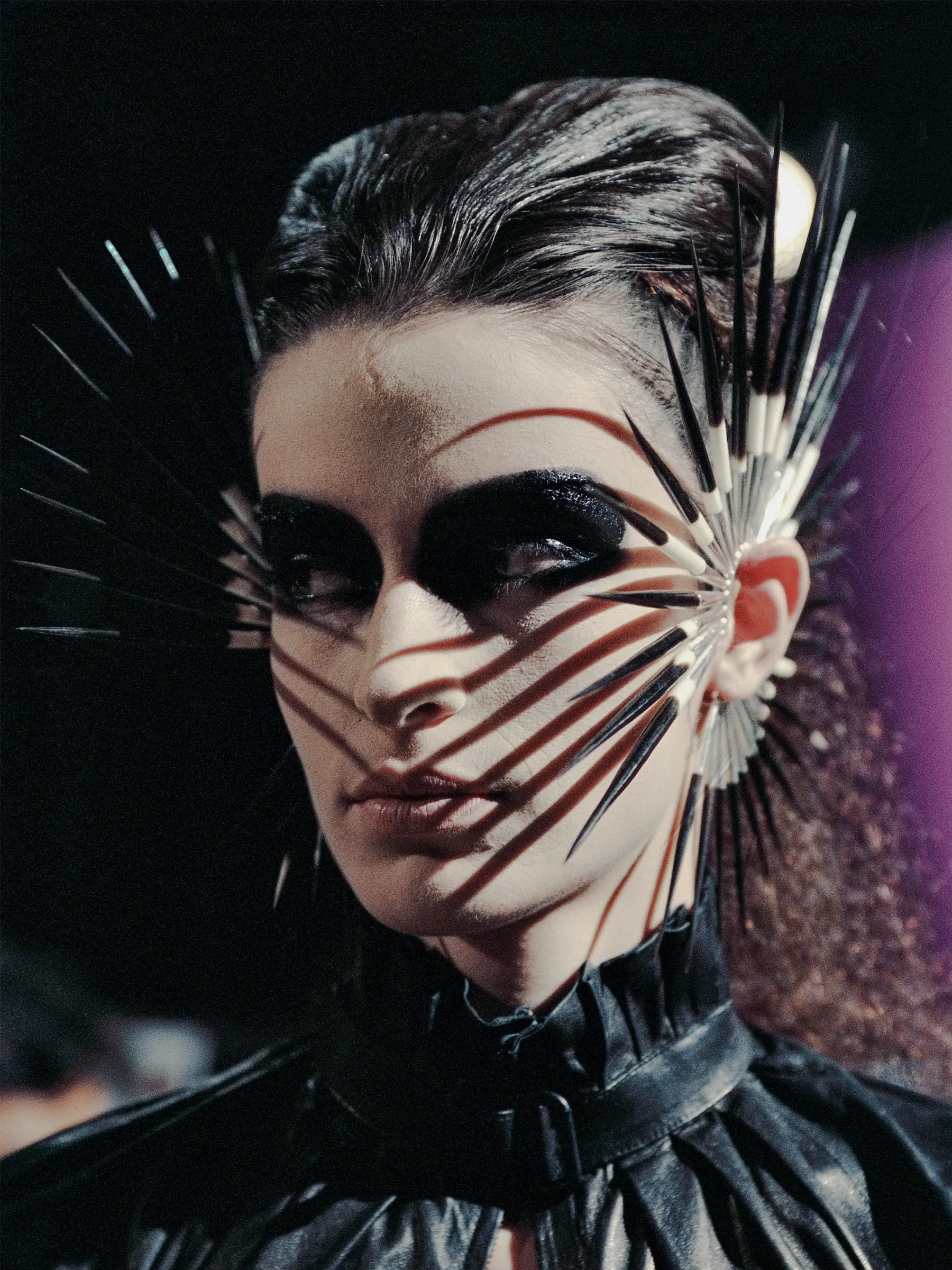 These striking silver quill earrings highlight designer Shaun Leane’s mastery of sharp, organic forms that defined early 2000s avant-garde fashion history.