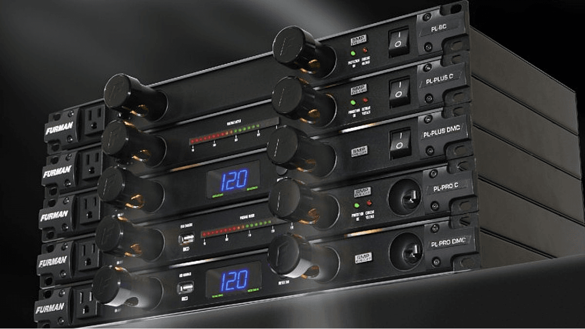 Furman power conditioners stacked in a rack.