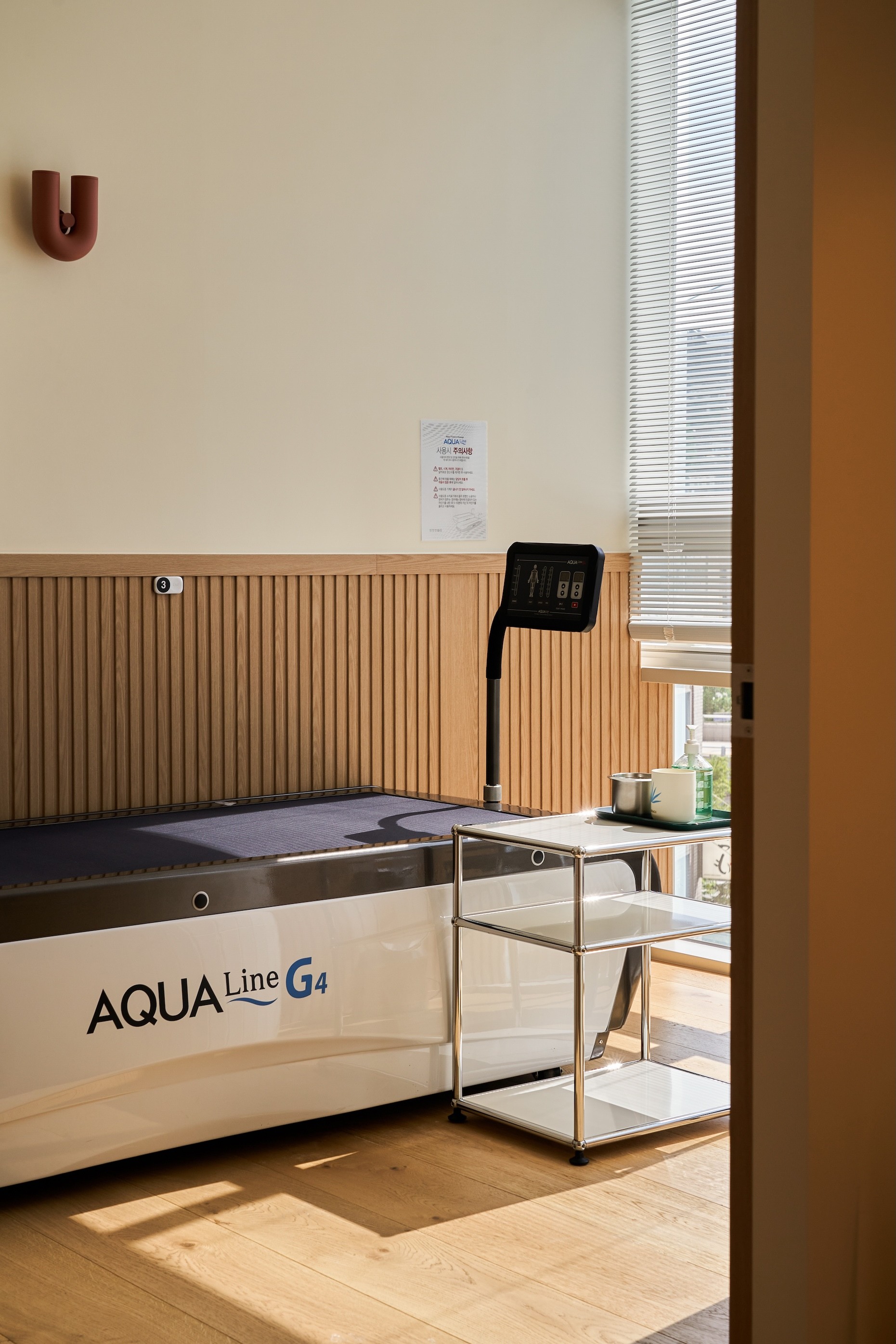 a room with aqua bed