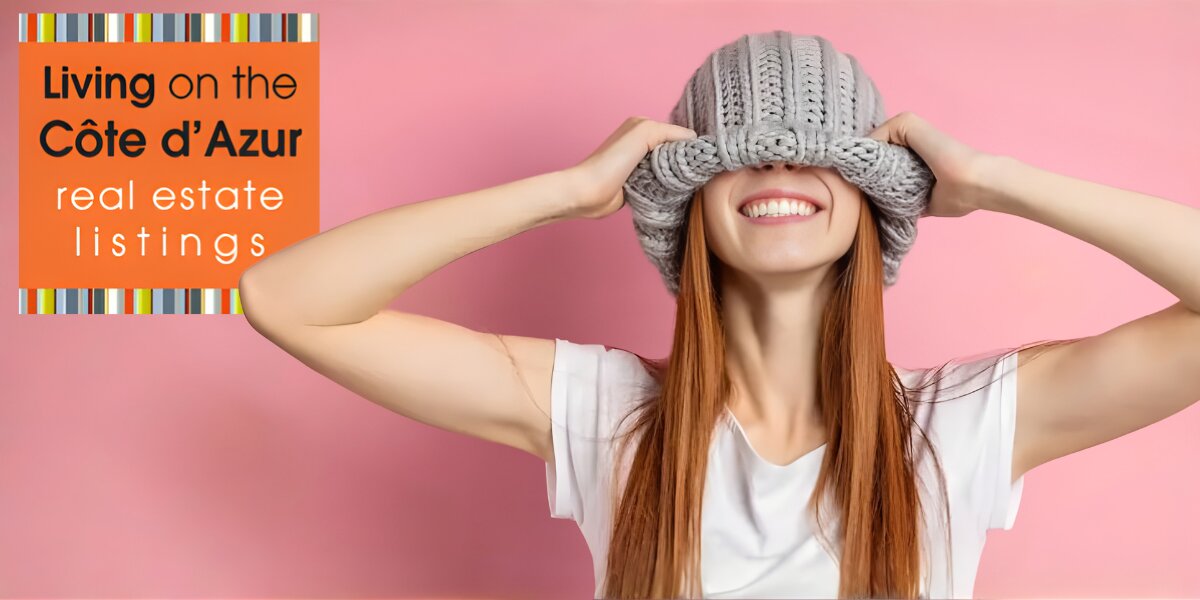A woman shielding her eyes, with the text "Living on the Côte d'Azur" overlaying an image of luxury real estate listings.