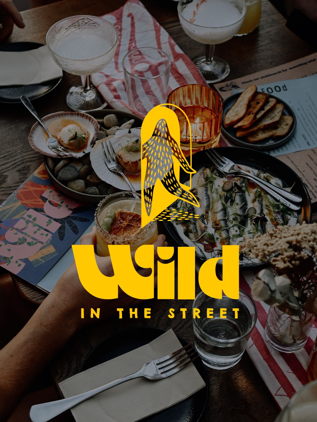 Wild in the street logo over photography of food