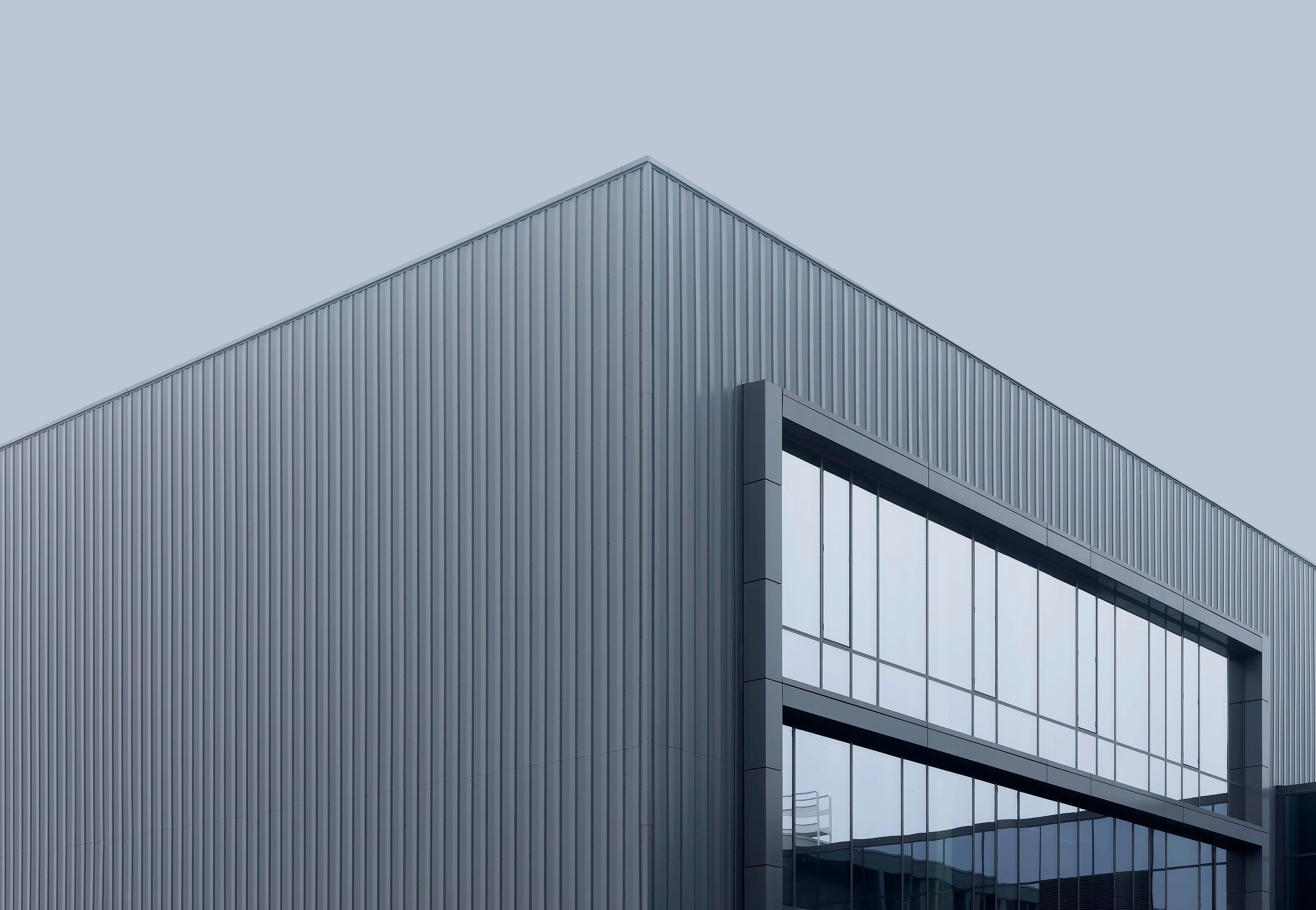 White textured surface with dark lines.