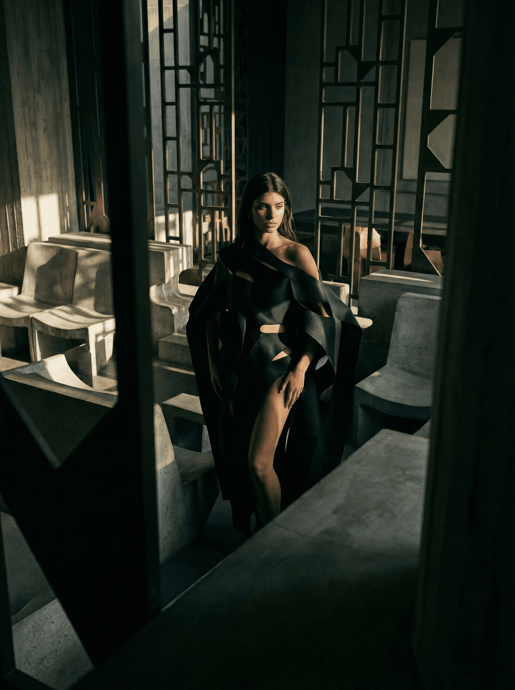 A woman with a backpack stands on the road