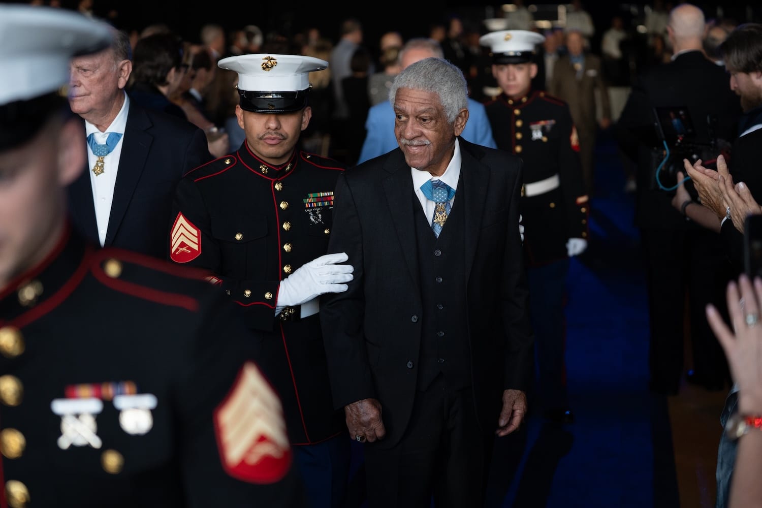 National Medal of Honor Grand Opening Soliders walking honoree
